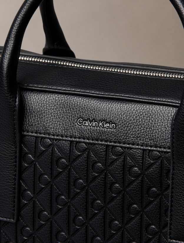 Embossed Monogram Logo Commuter Bag