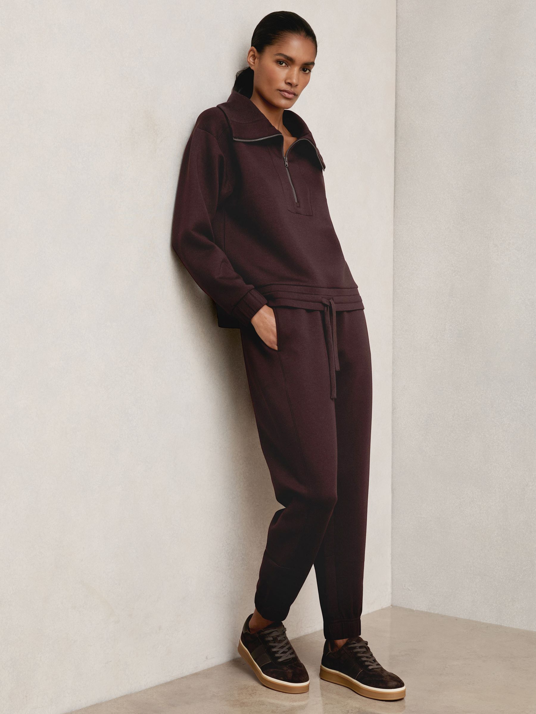 Interlock Tapered Joggers in Plum