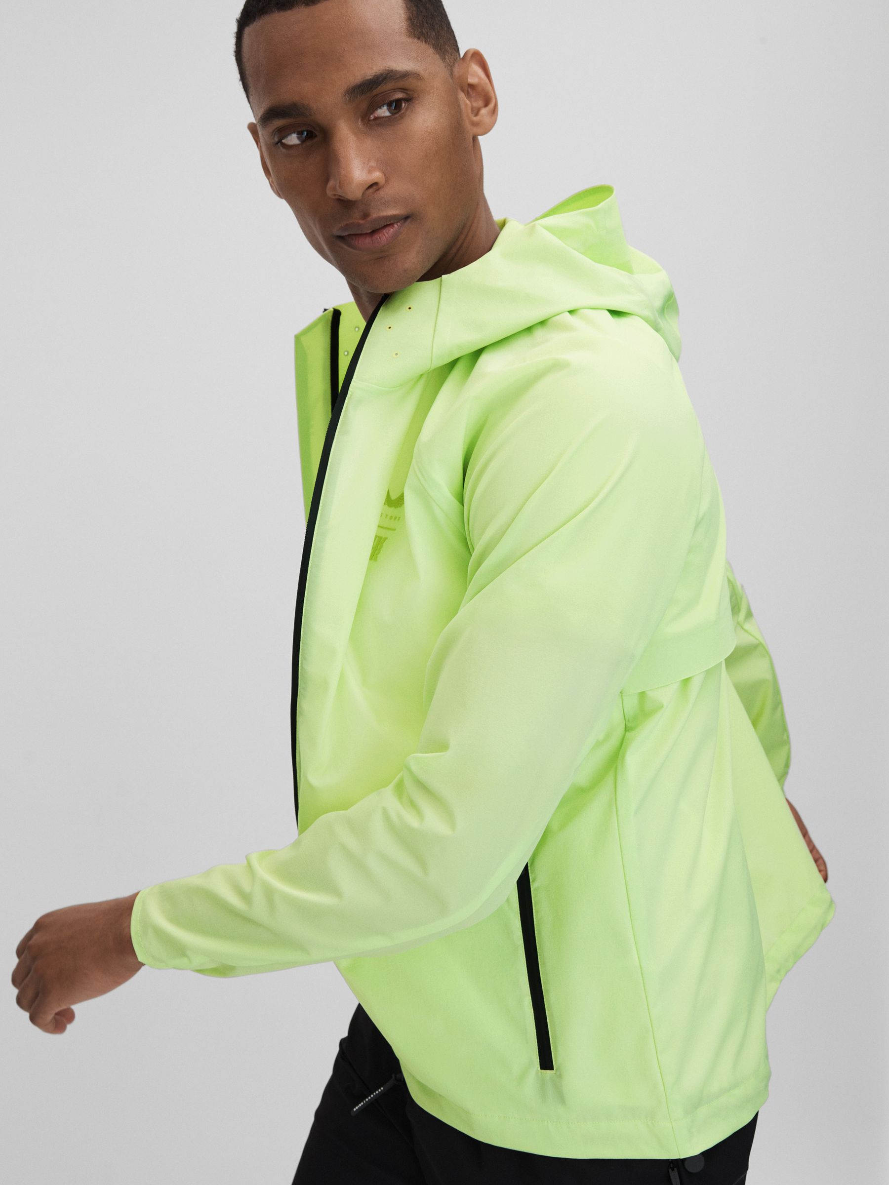 Castore Water Repellent Running Jacket in Iced Citrus Yellow