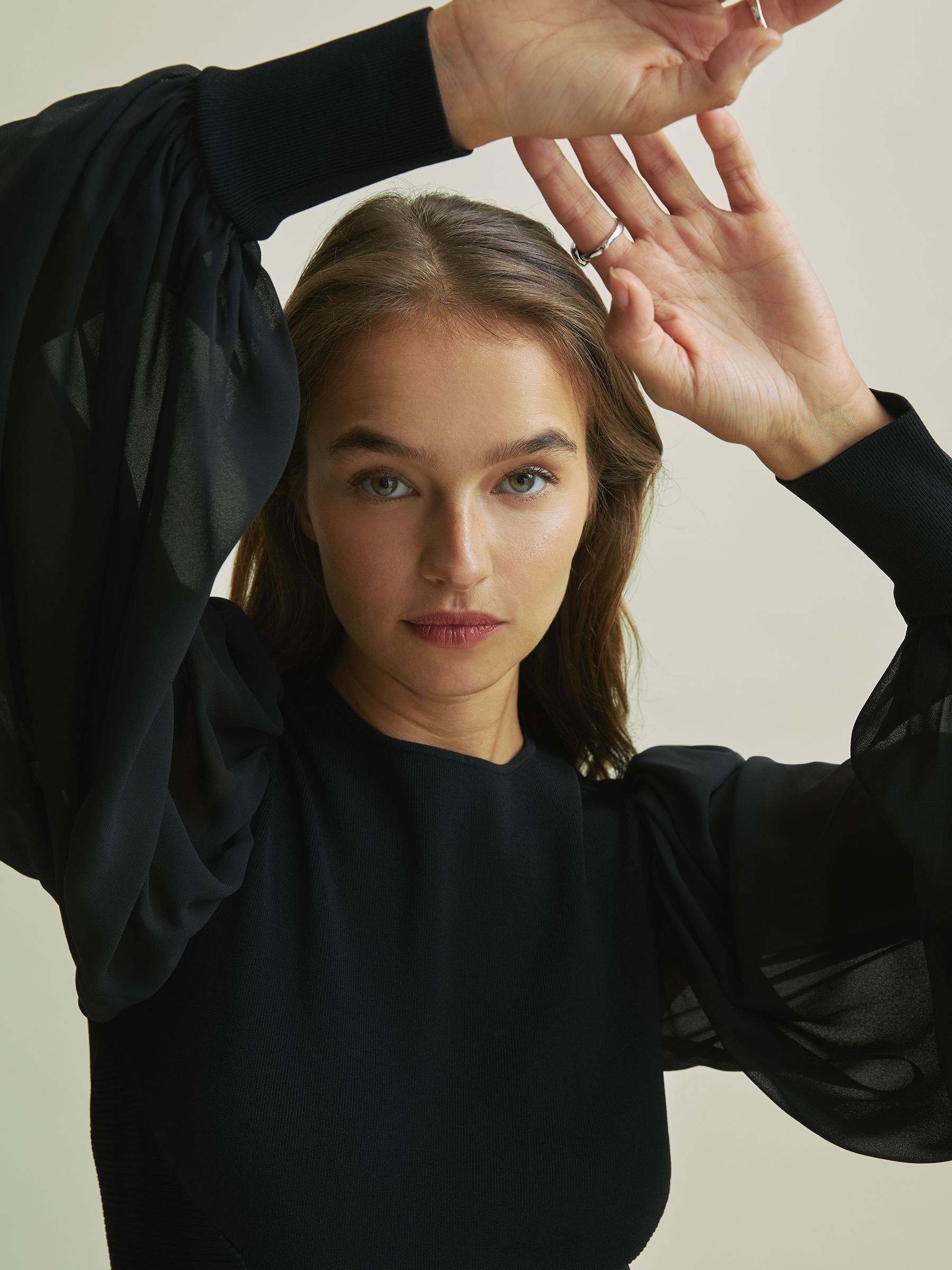 Florere Hybrid Knit Sheer Sleeve Black Top in Black