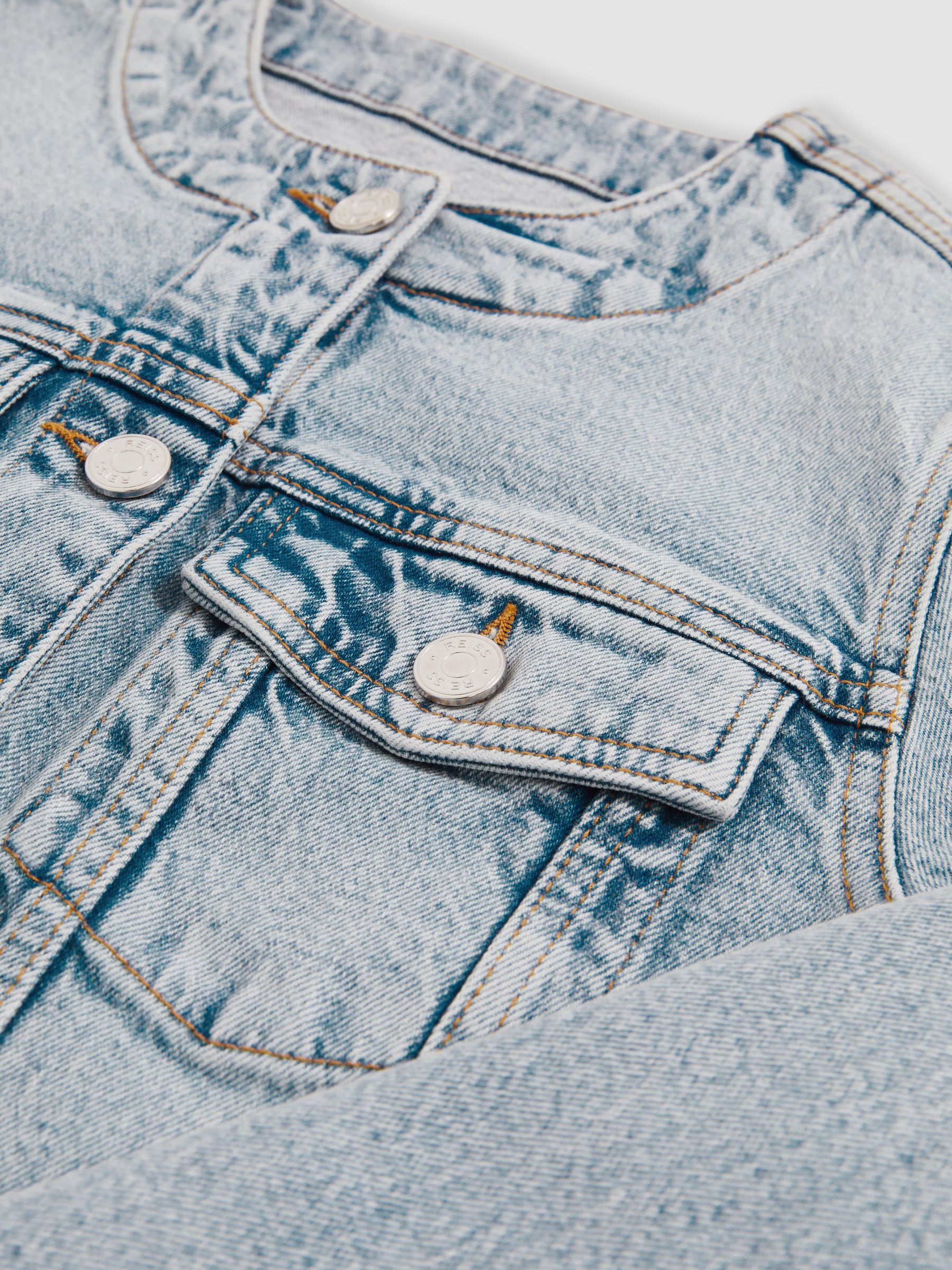 Collarless Cropped Denim Jacket in Light Blue