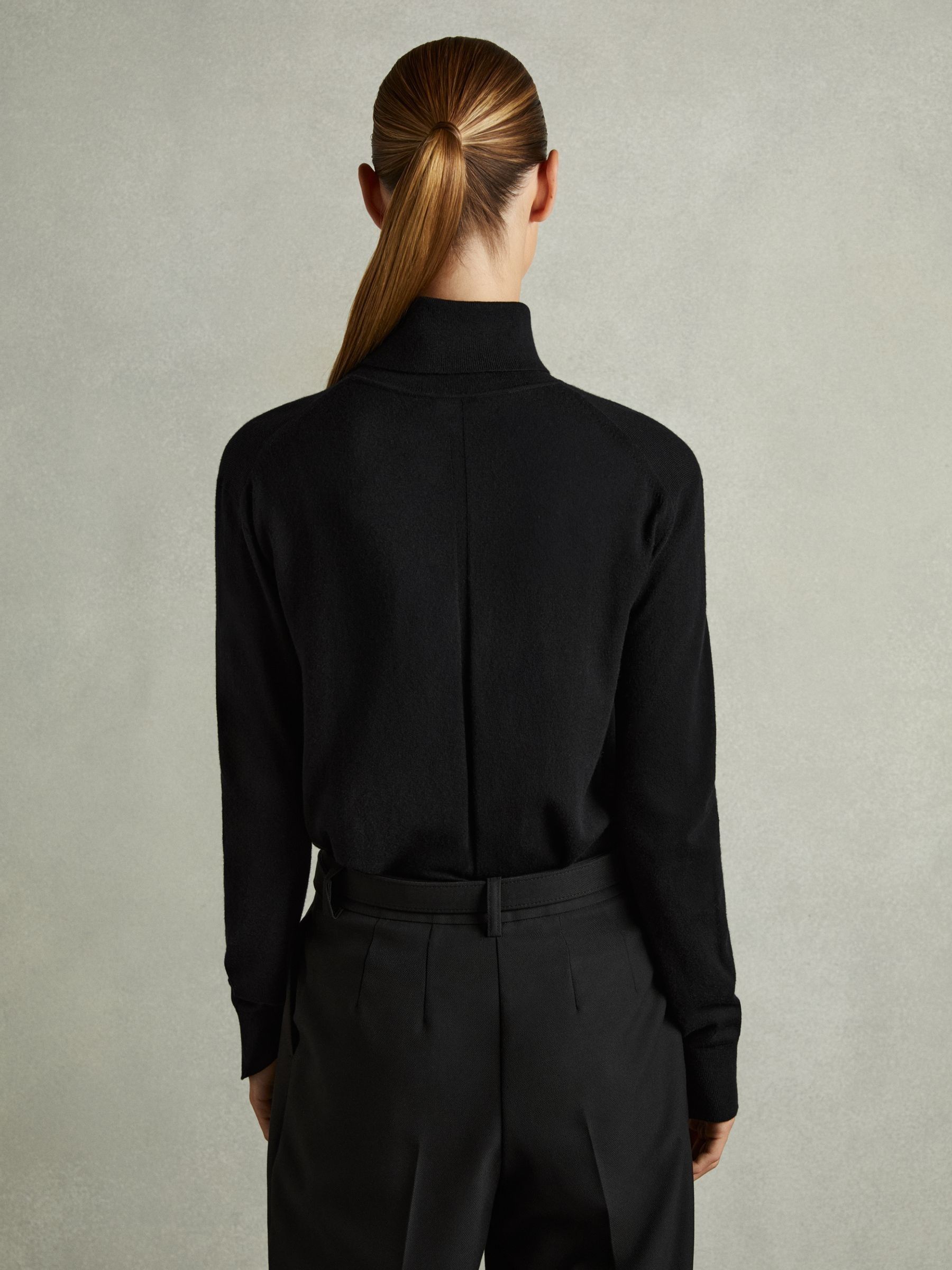 Merino Wool Roll Neck Jumper in Black