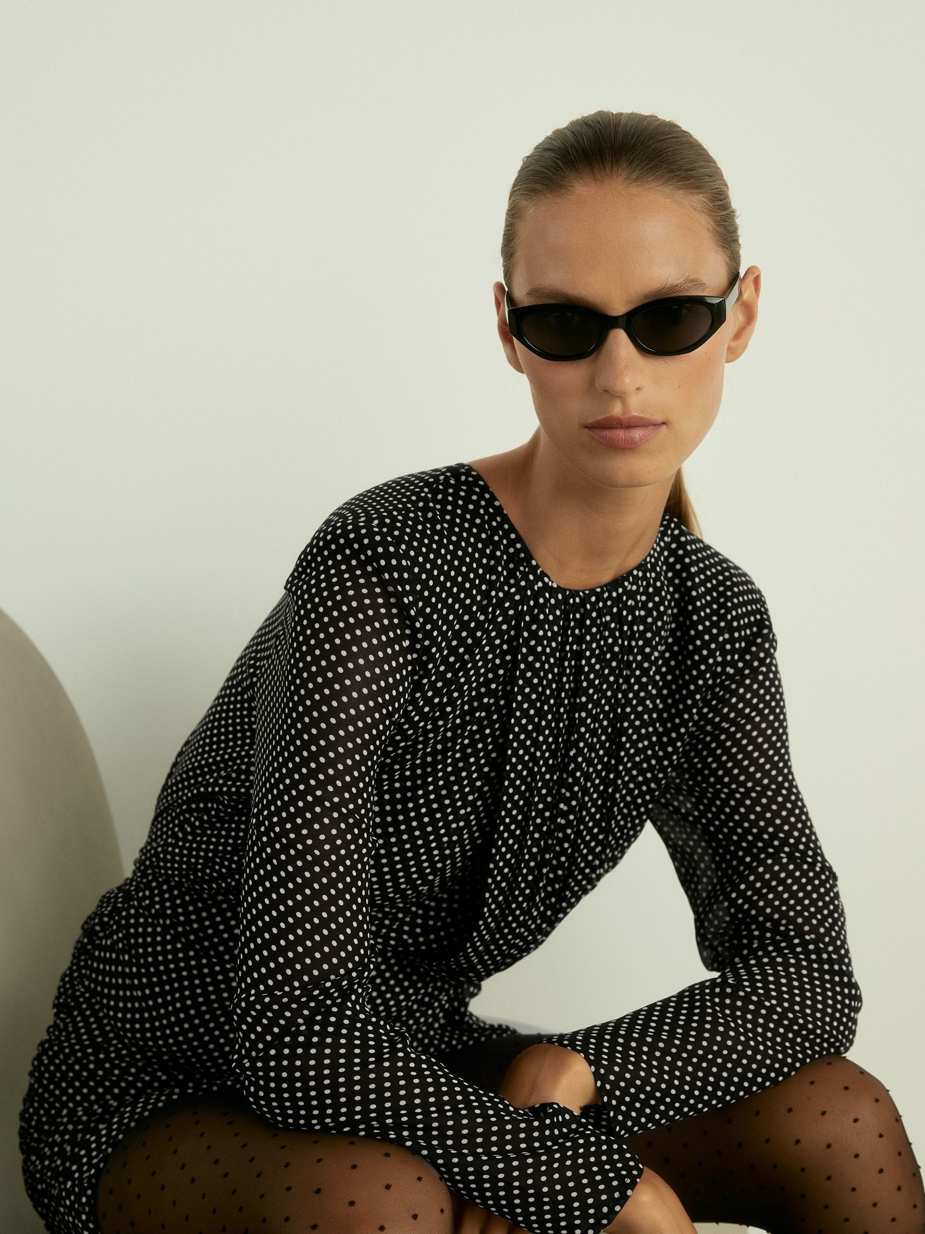 Gathered Polka-Dot Georgette Mini Dress in Black