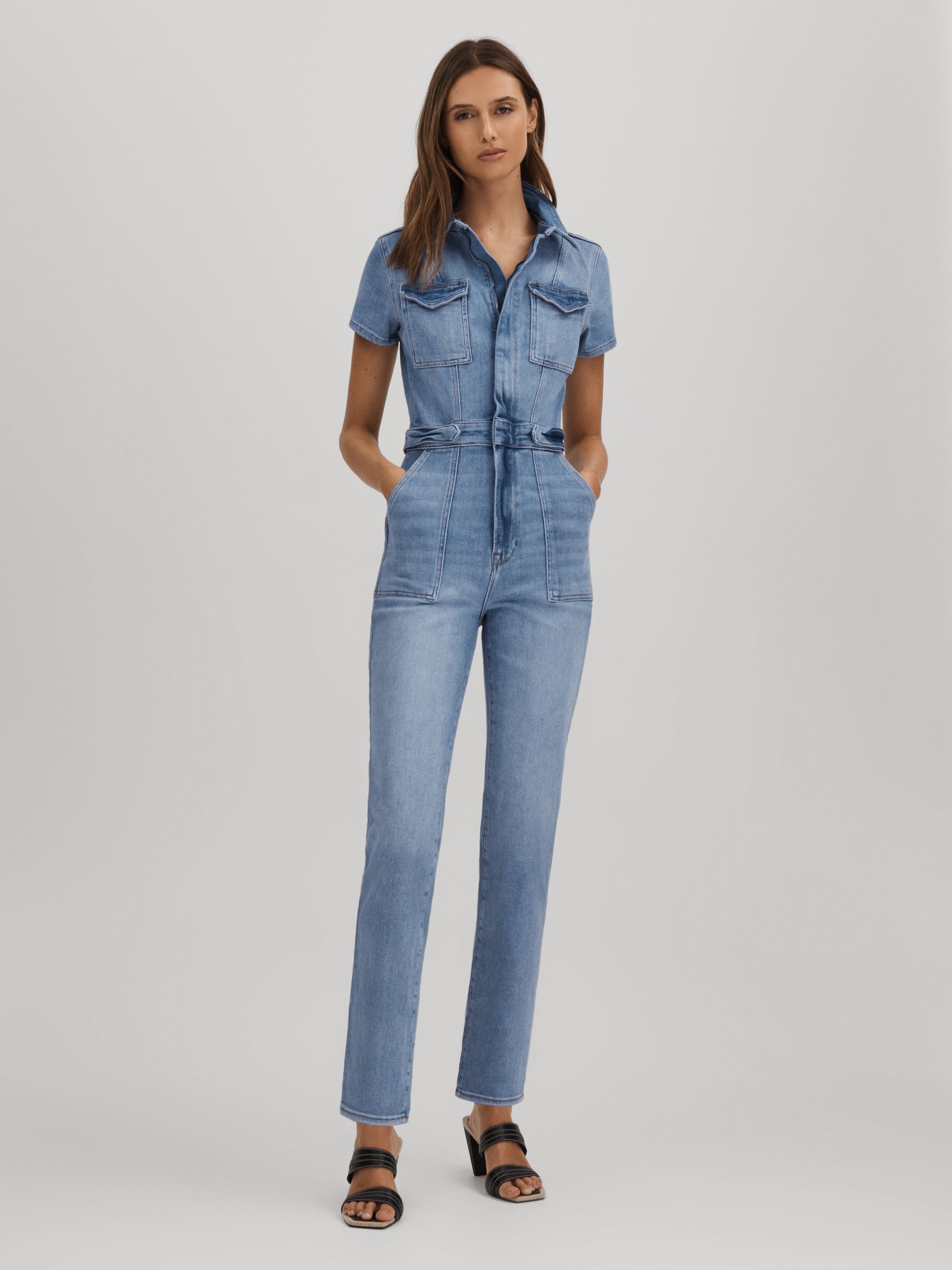 Good American Denim Skinny Jumpsuit in Mid Blue