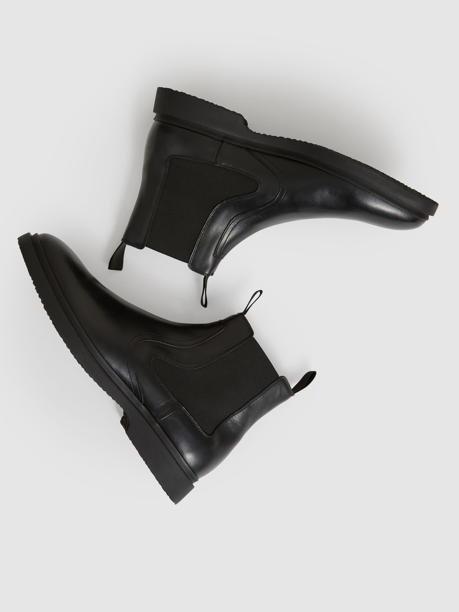 Leather Rubber Sole Chelsea Boots in Black