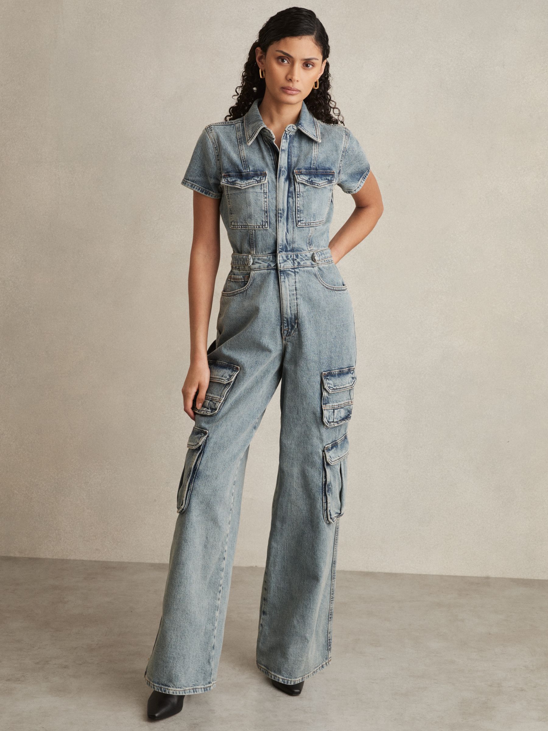 Good American Denim Cargo Jumpsuit in Indigo