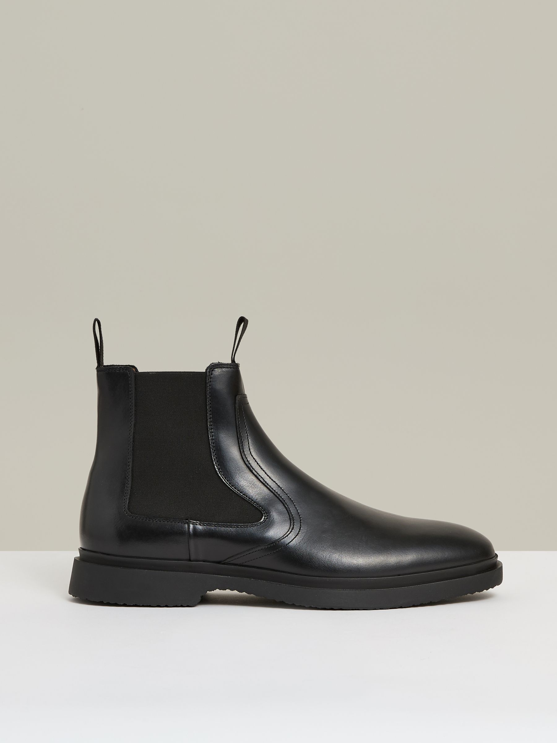 Leather Rubber Sole Chelsea Boots in Black