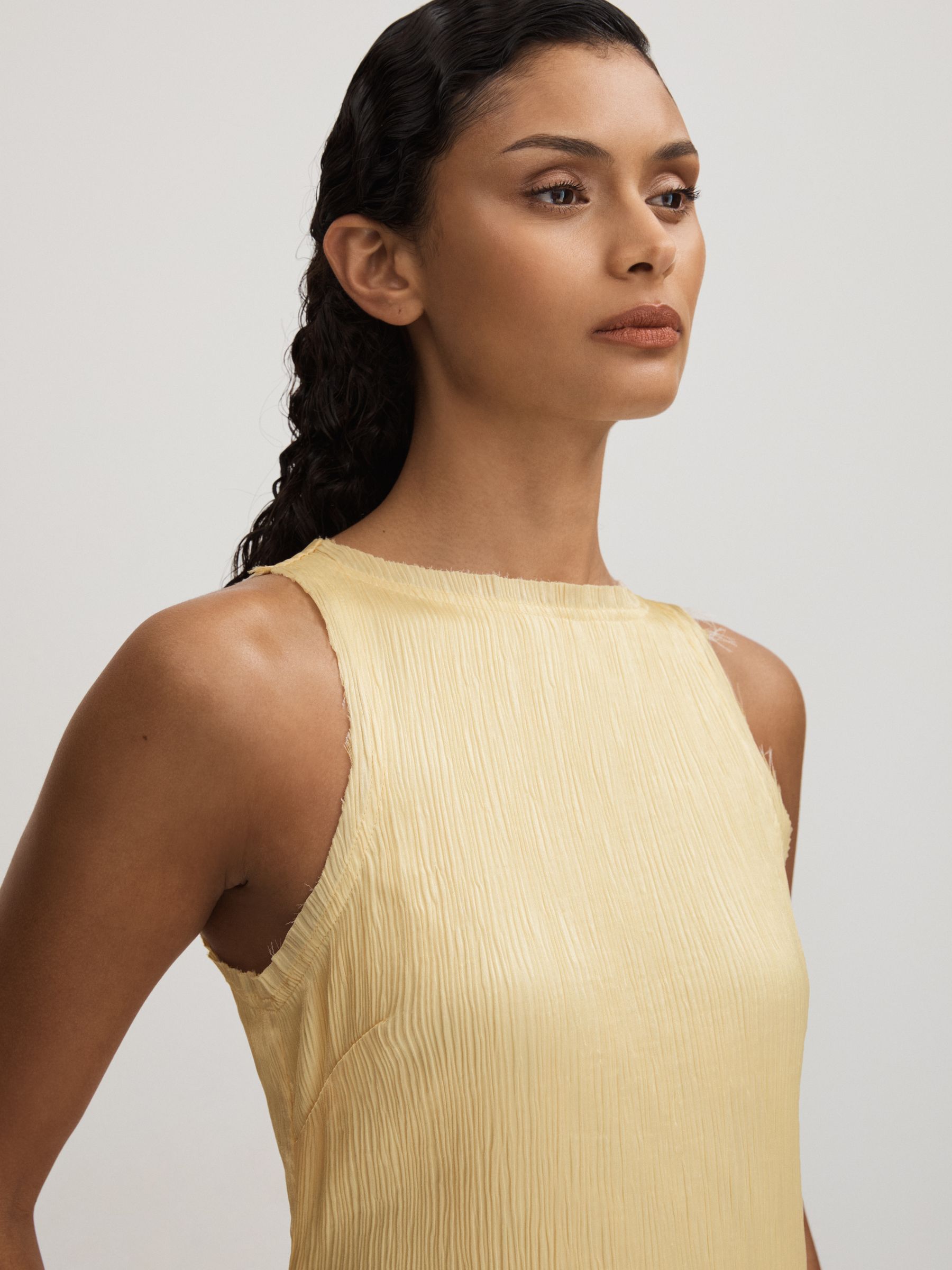 Enya Buttercup Anna Quan Plisse Raw Hem Maxi Dress