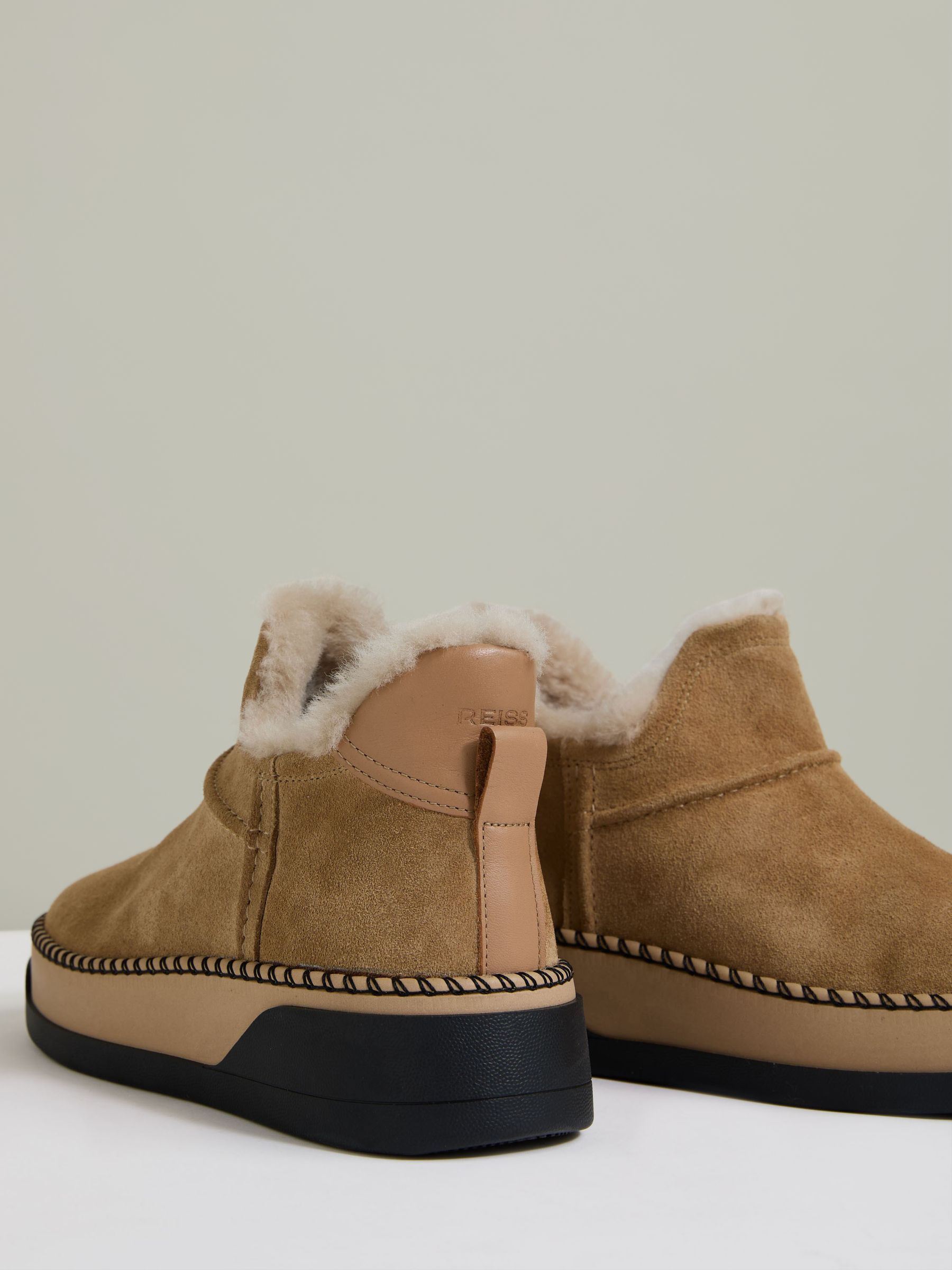 Shearling-Lined Suede Ankle Boots in Tan