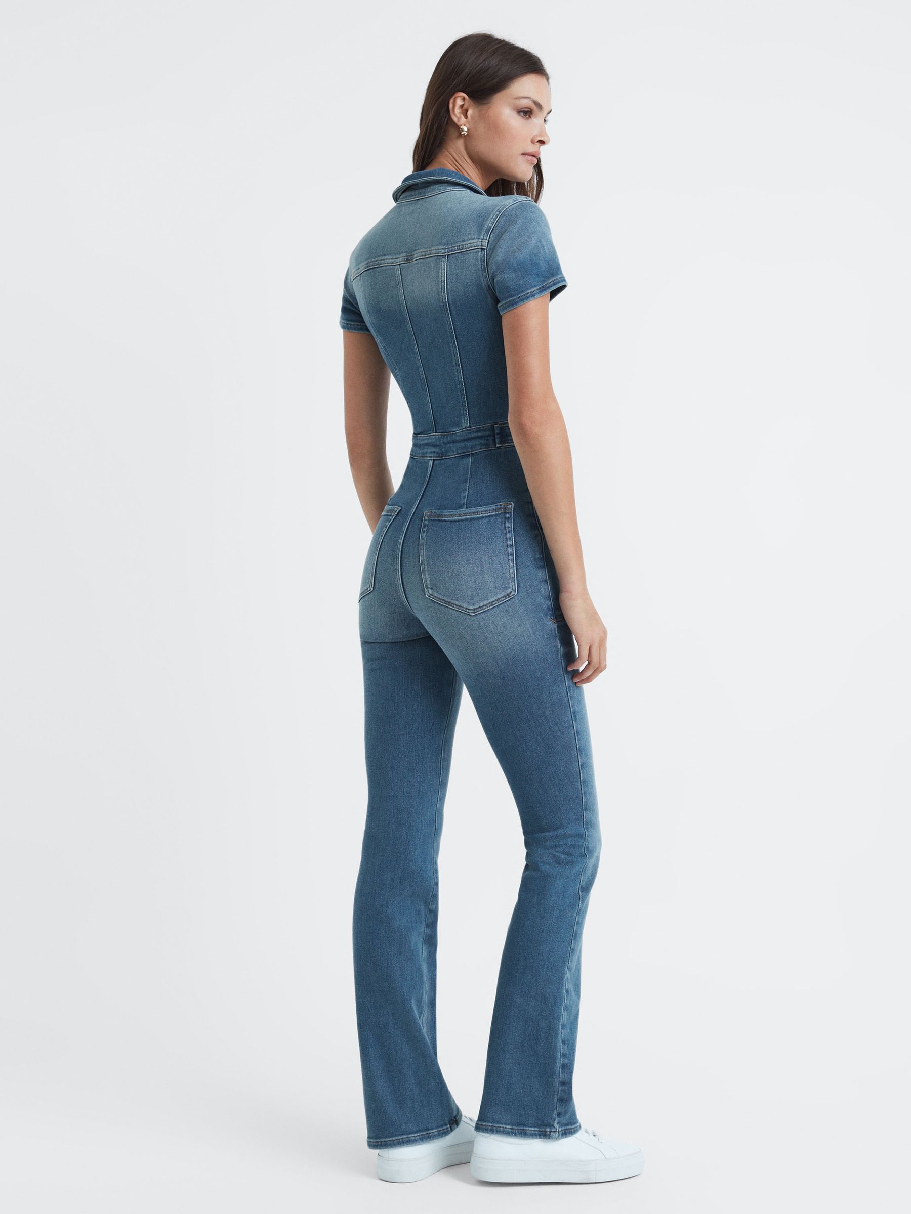 Good American Denim Bootcut Jumpsuit in Blue