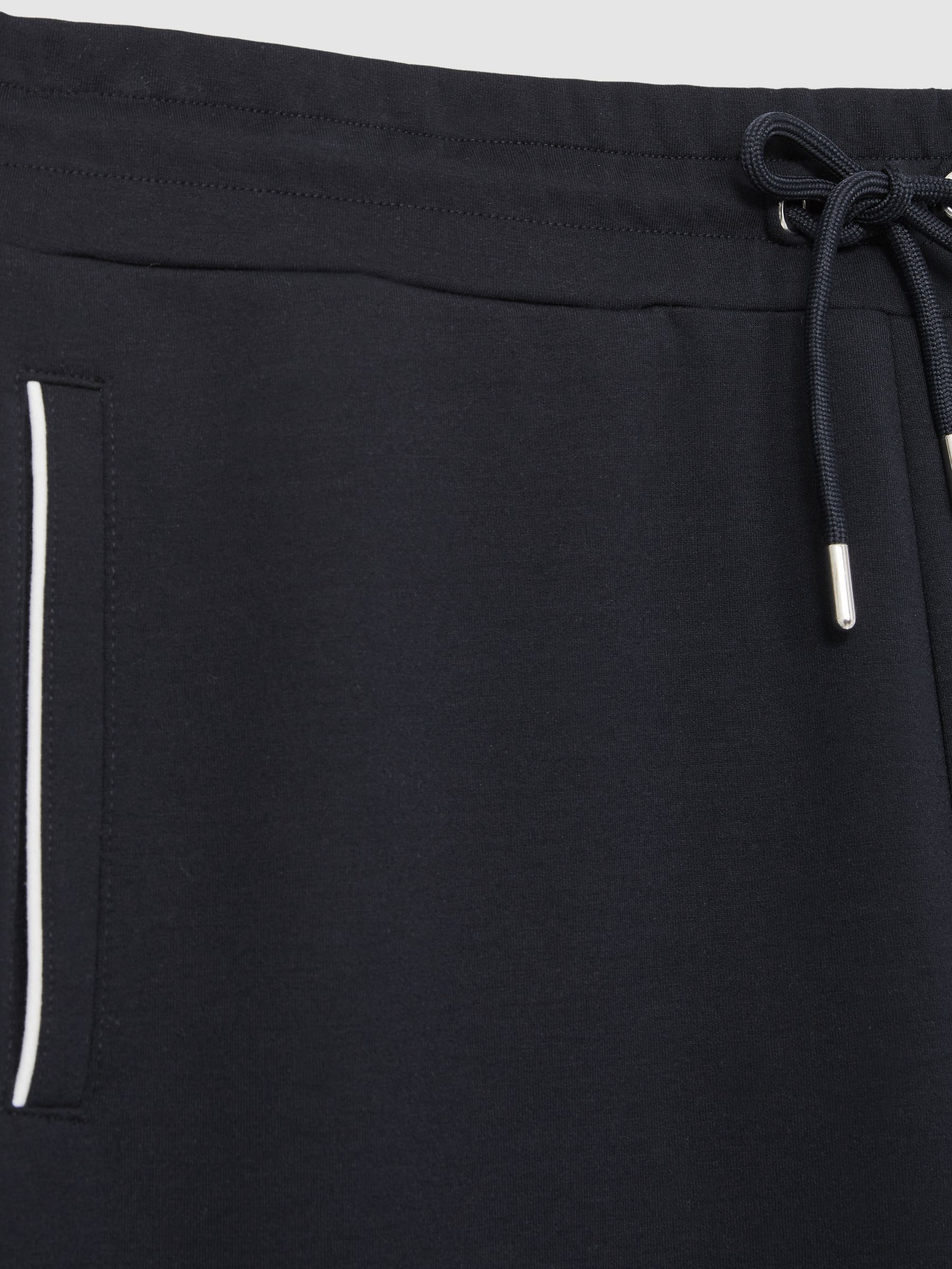 Interlock Piped Drawstring Joggers in Navy