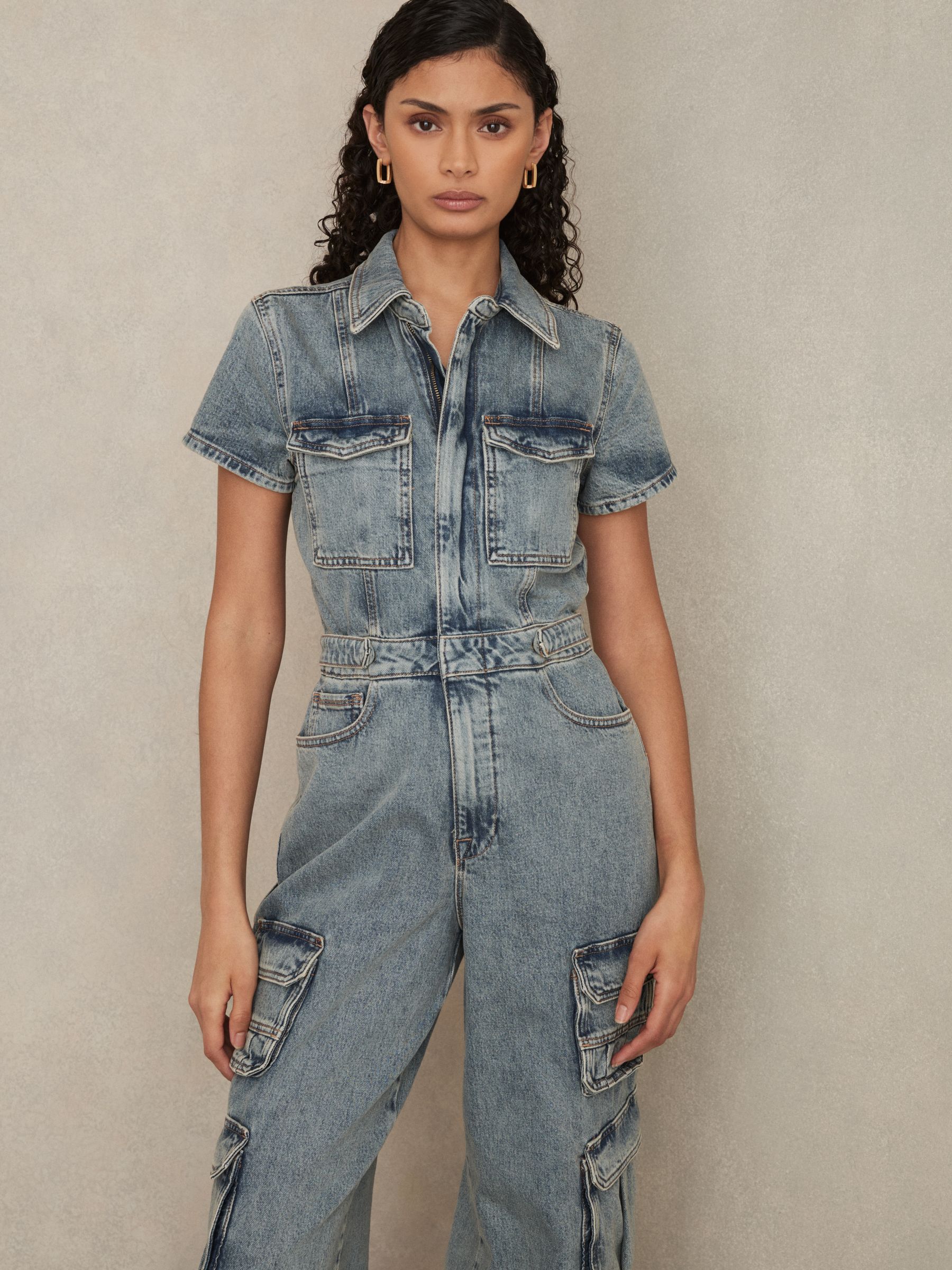 Good American Denim Cargo Jumpsuit in Indigo