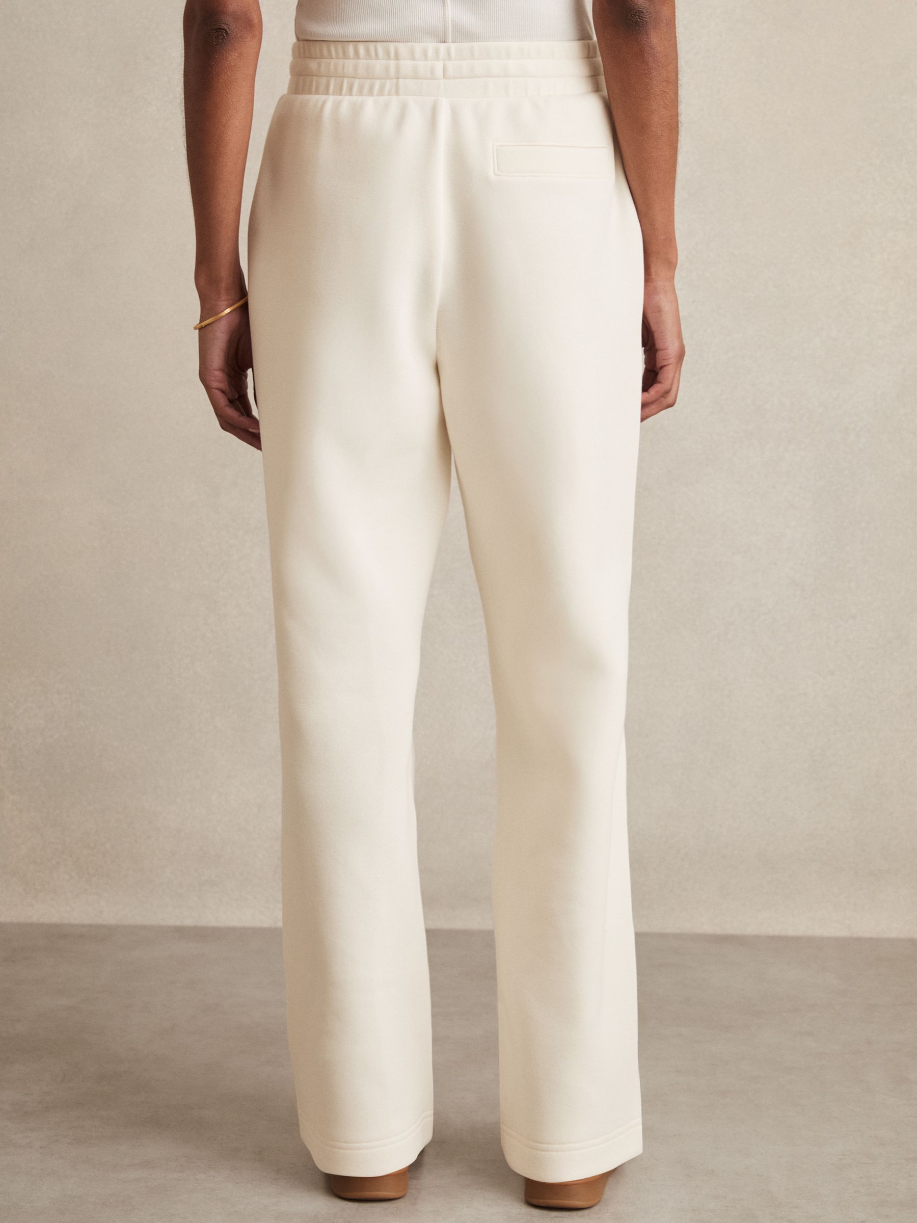 Cotton-Blend Interlock Wide-Leg Joggers in Ivory