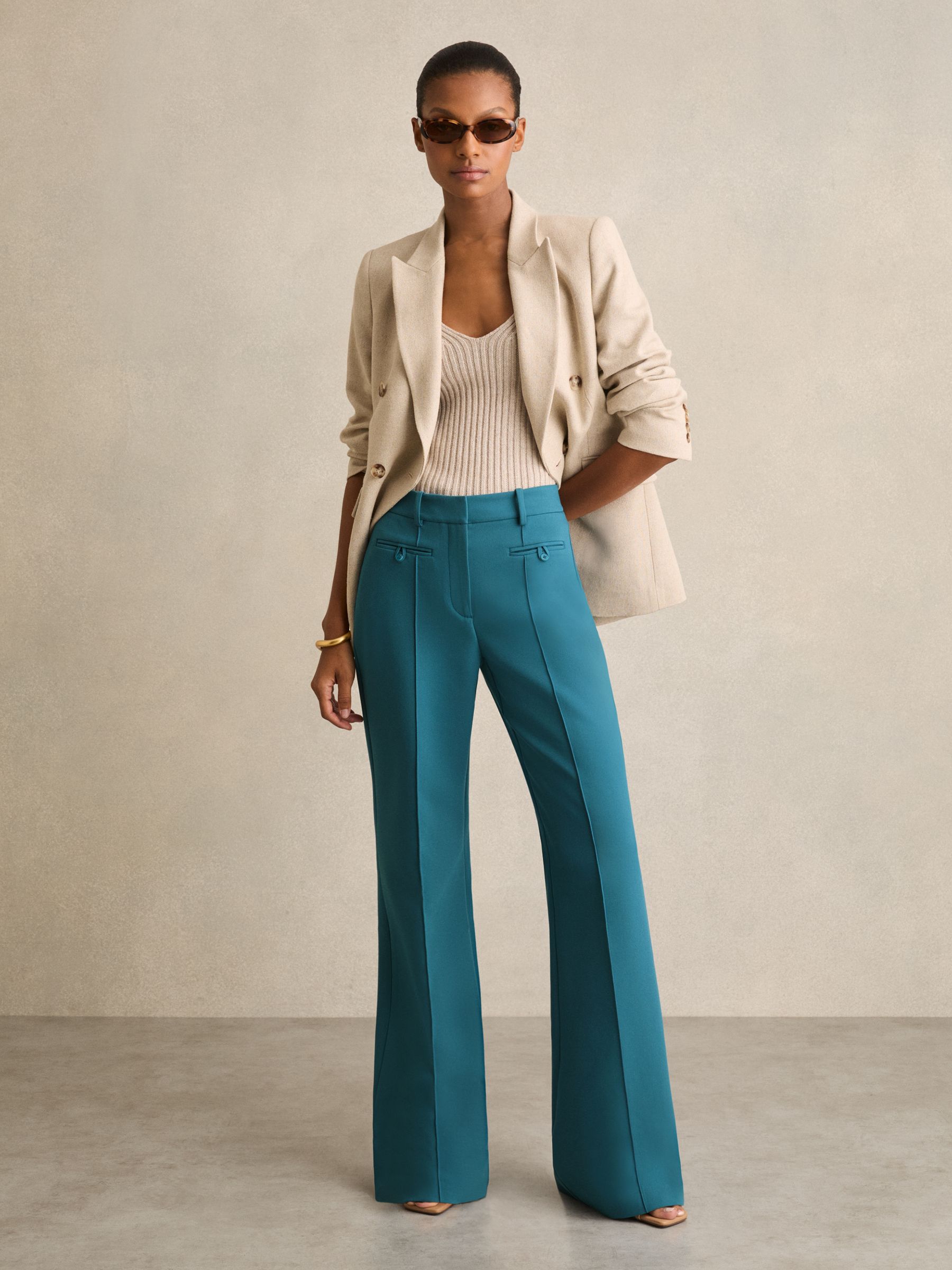 Welt Pocket Flared Trousers in Teal