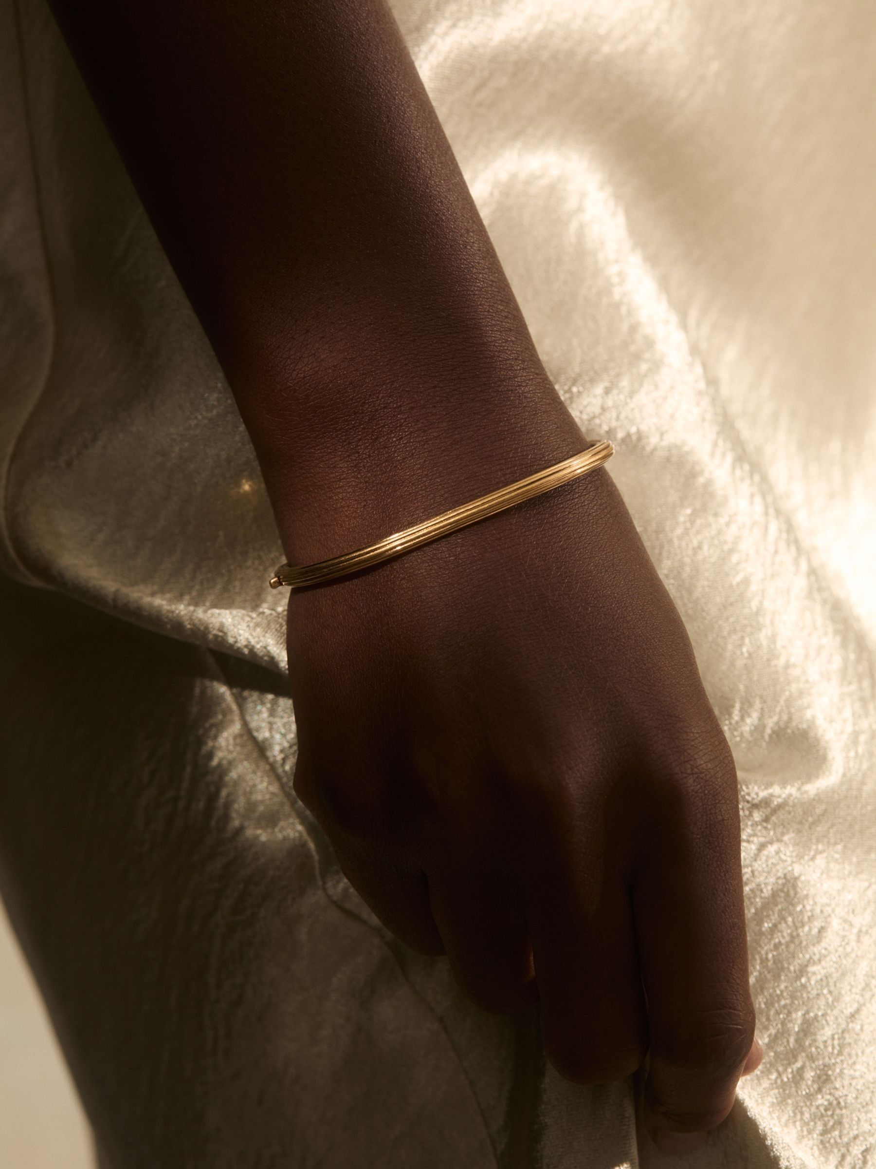 Contour Hinged Cuff in Gold Tone