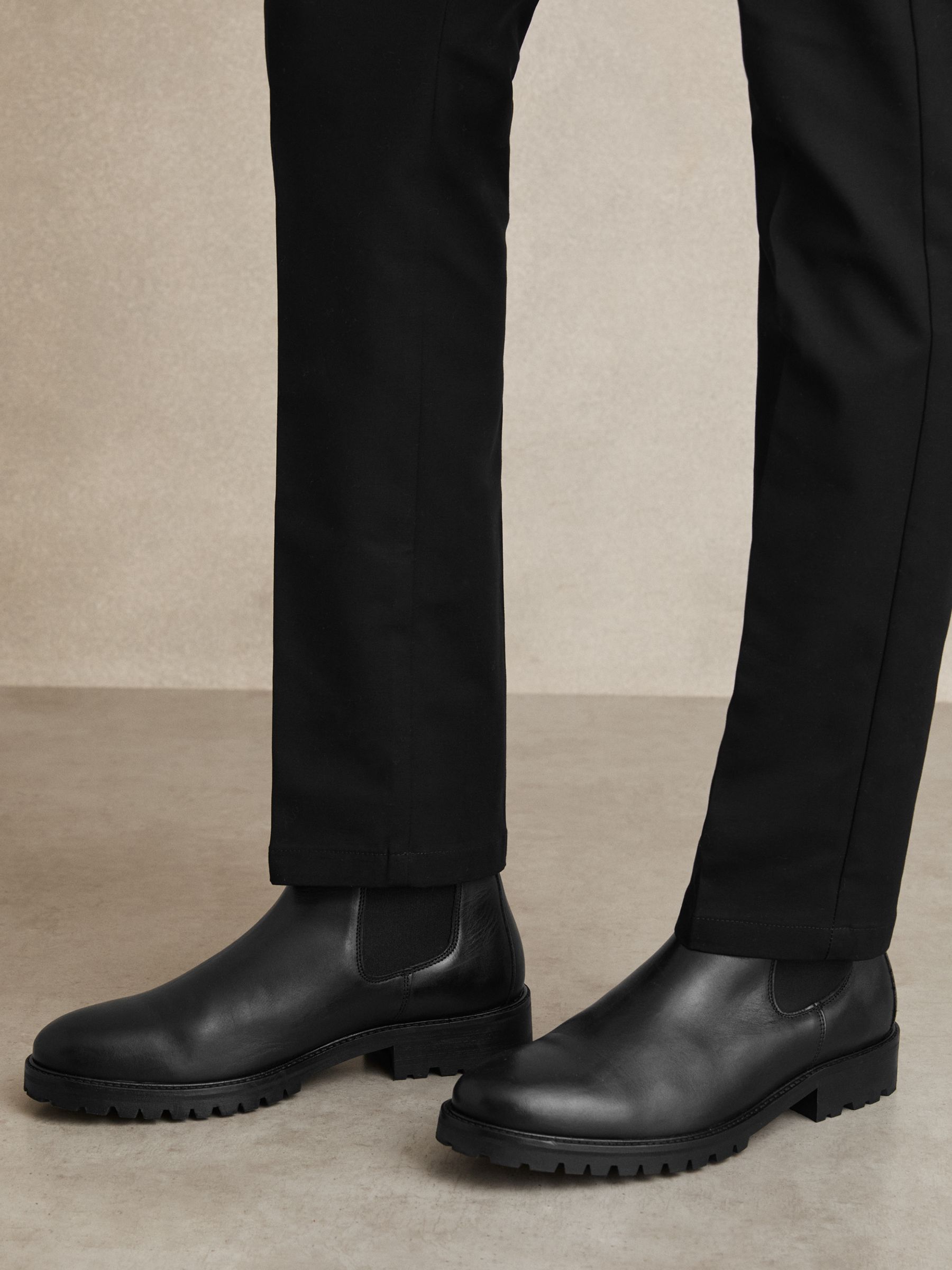 Leather Rubber Sole Chelsea Boots in Black