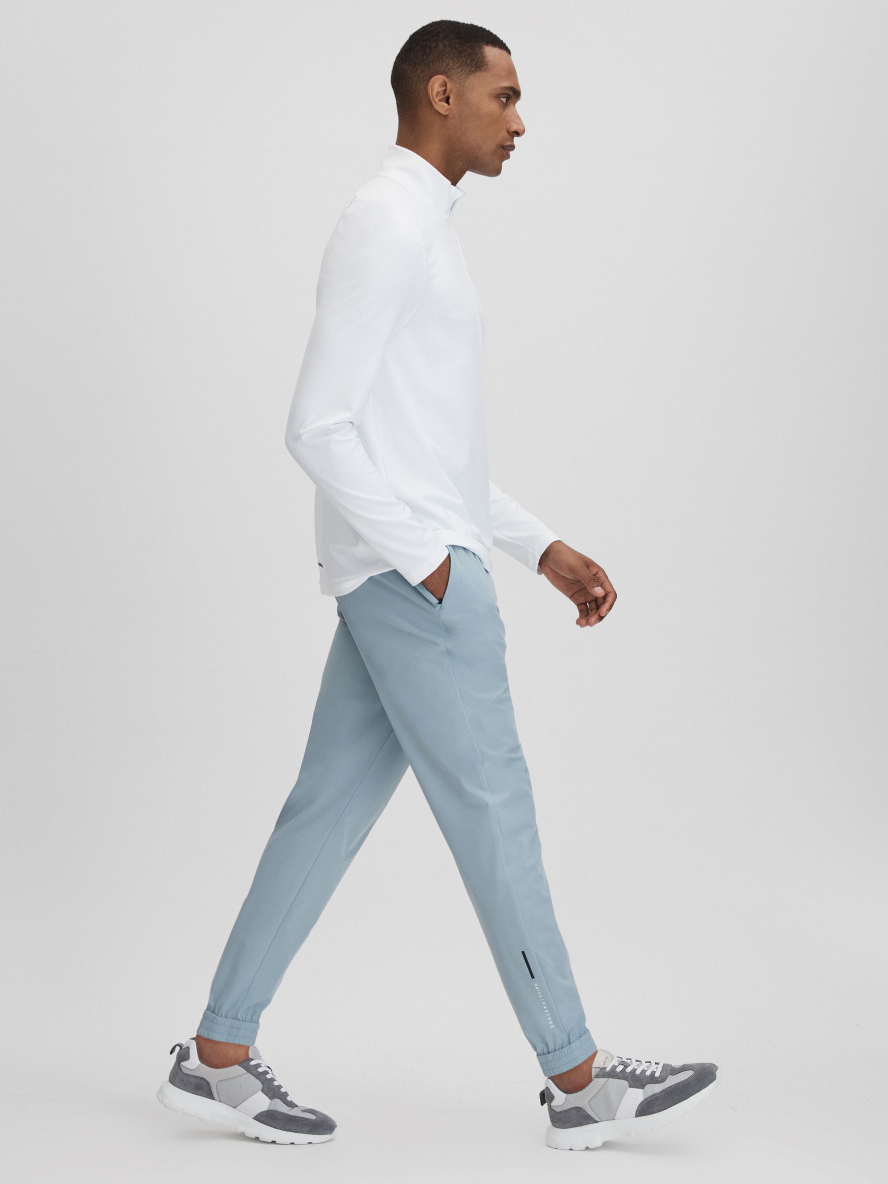 Castore Water Repellent Track Joggers in Blue Silver