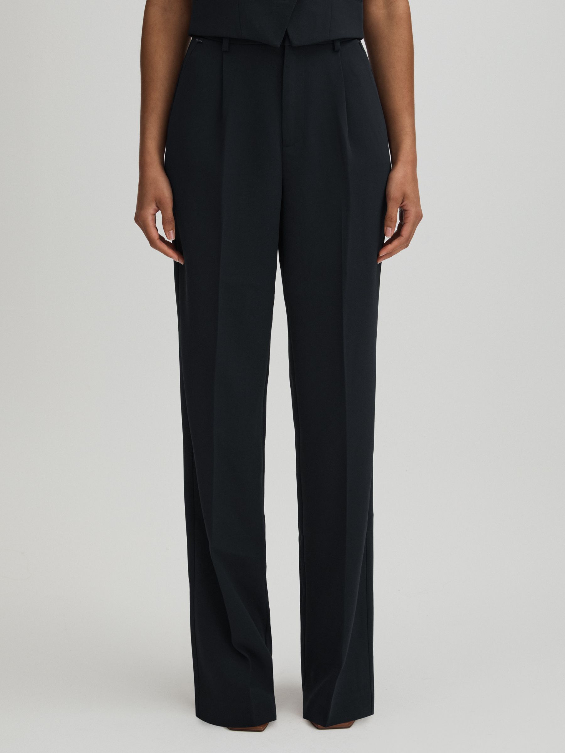 Good American High Rise Pleat Front Trousers in Navy