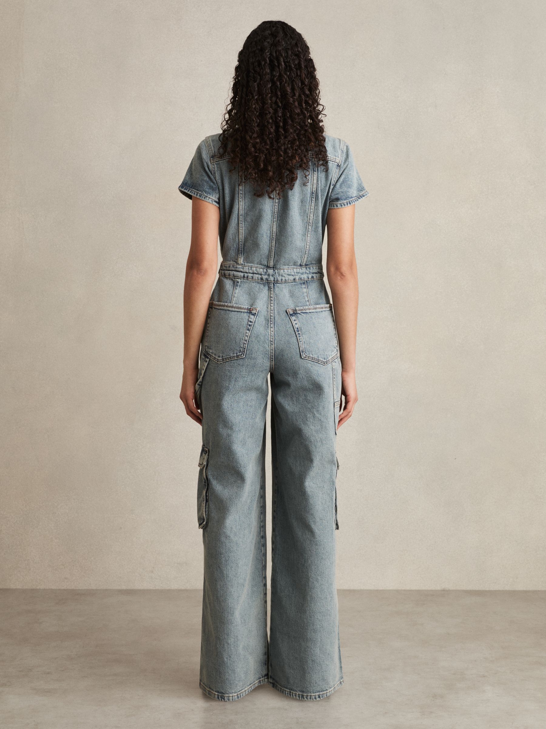 Good American Denim Cargo Jumpsuit in Indigo