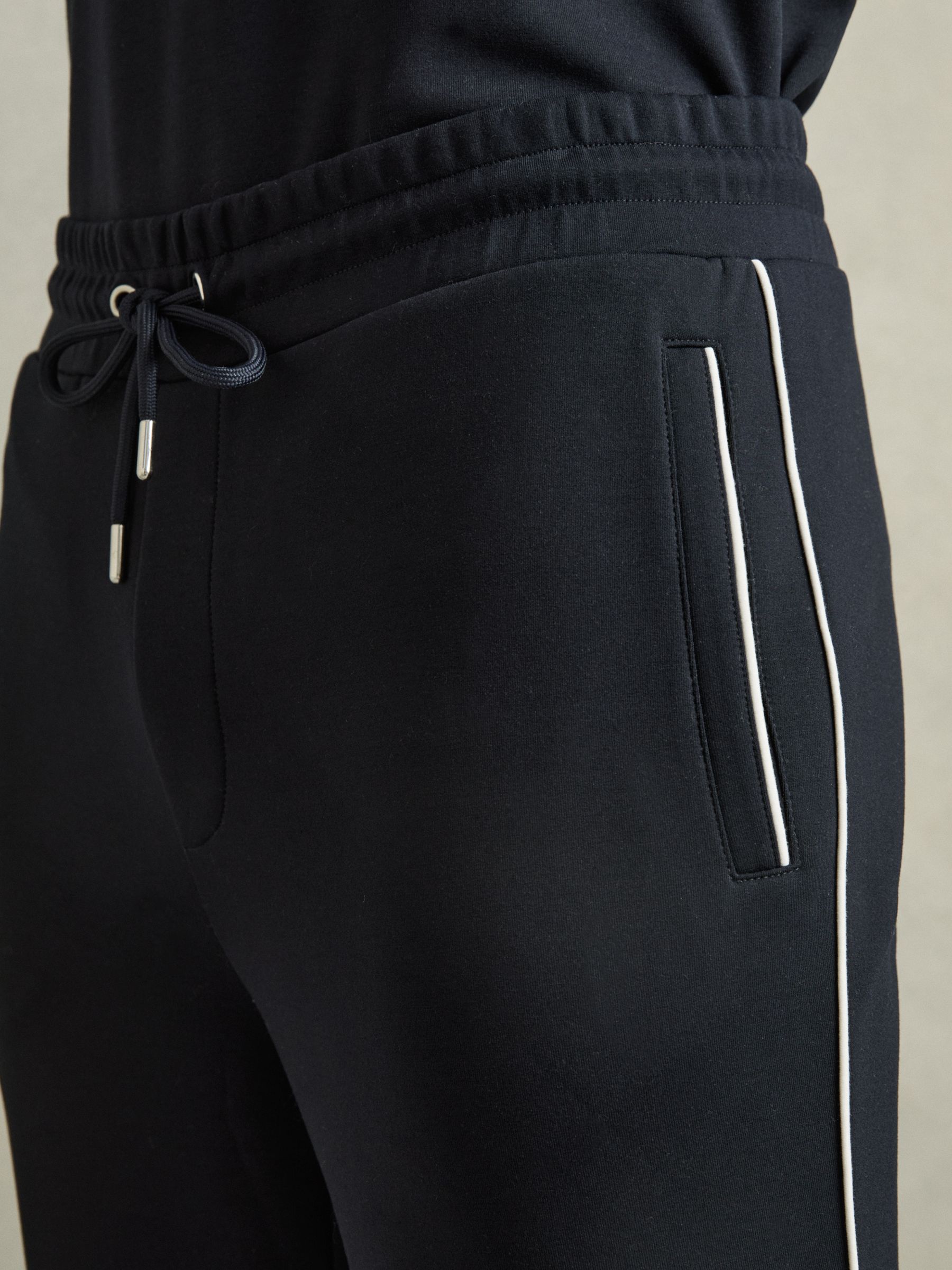 Interlock Piped Drawstring Joggers in Navy