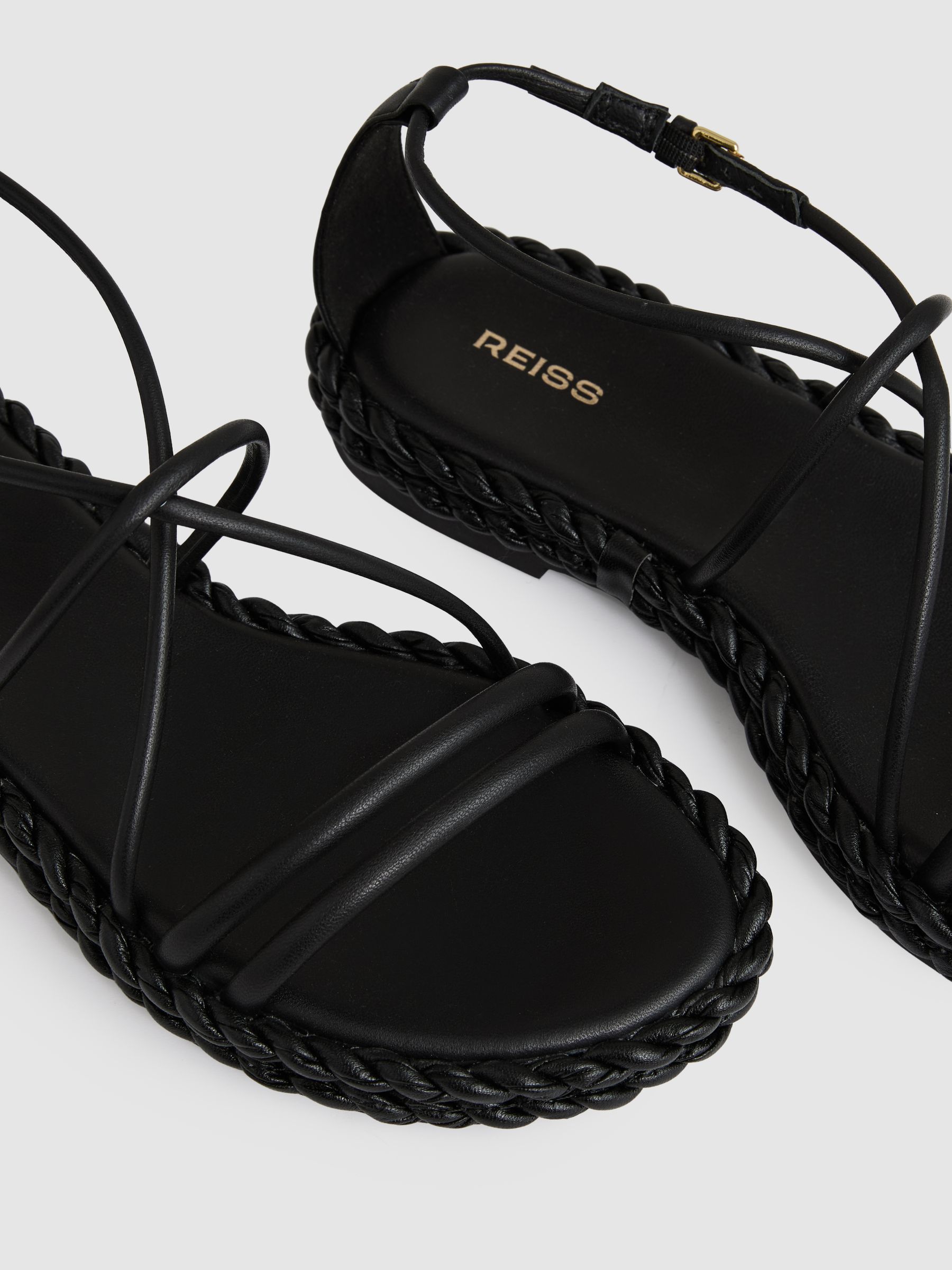 Leather Braided Flat Sandals in Black