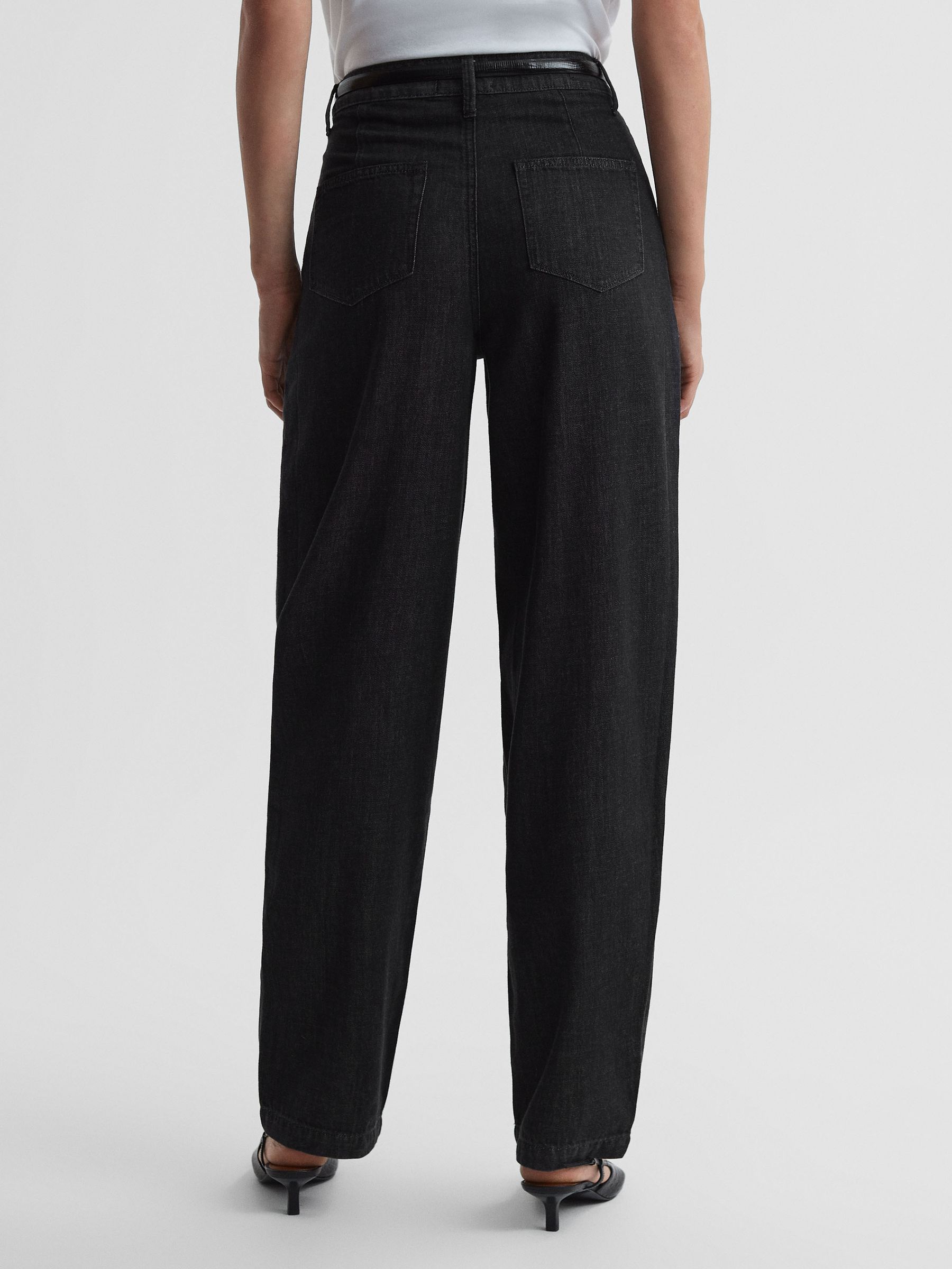 Paige High Rise Tapered Jeans in Washed Black