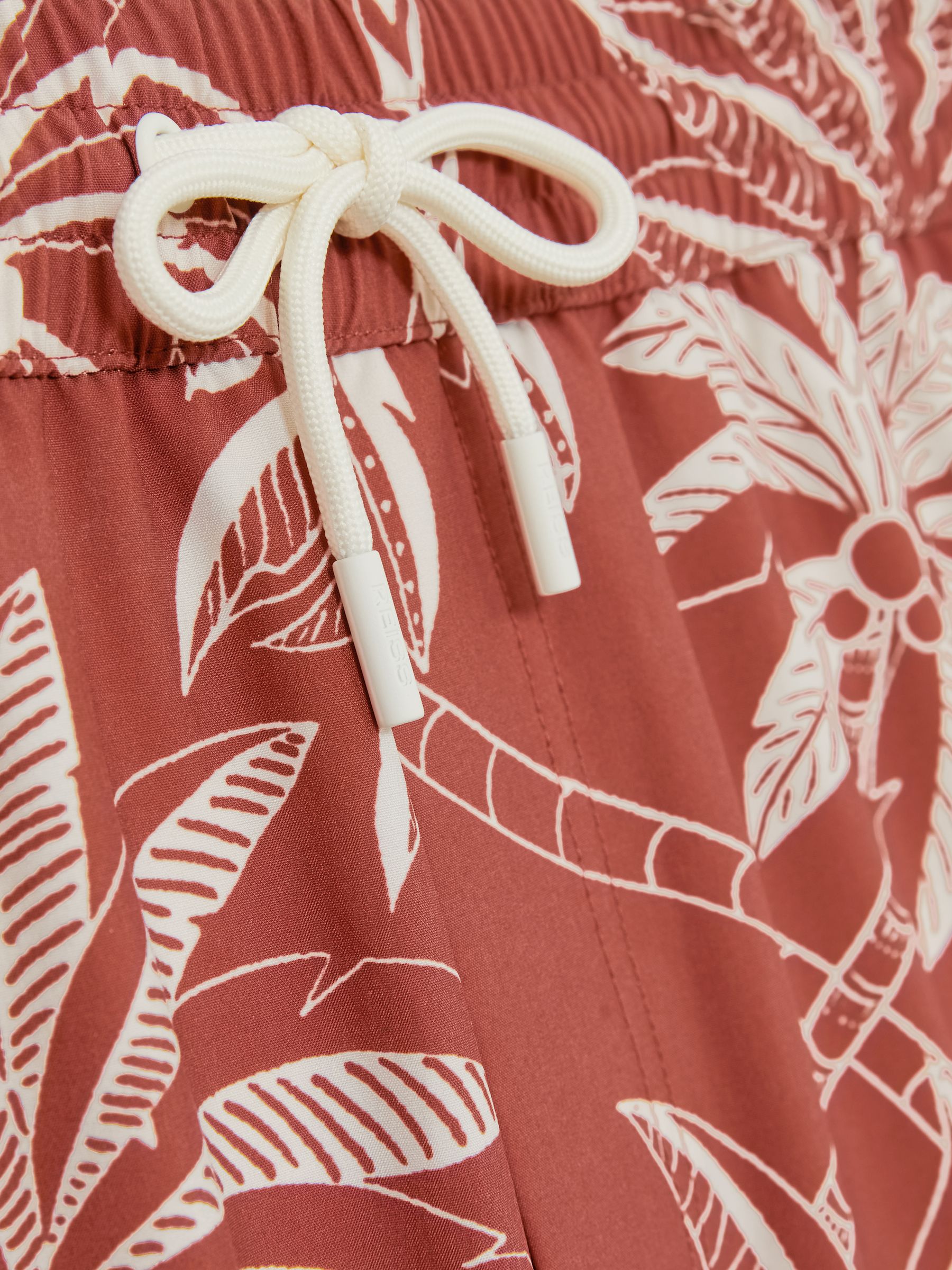 Palm Print Swim Shorts in Brick Red/White