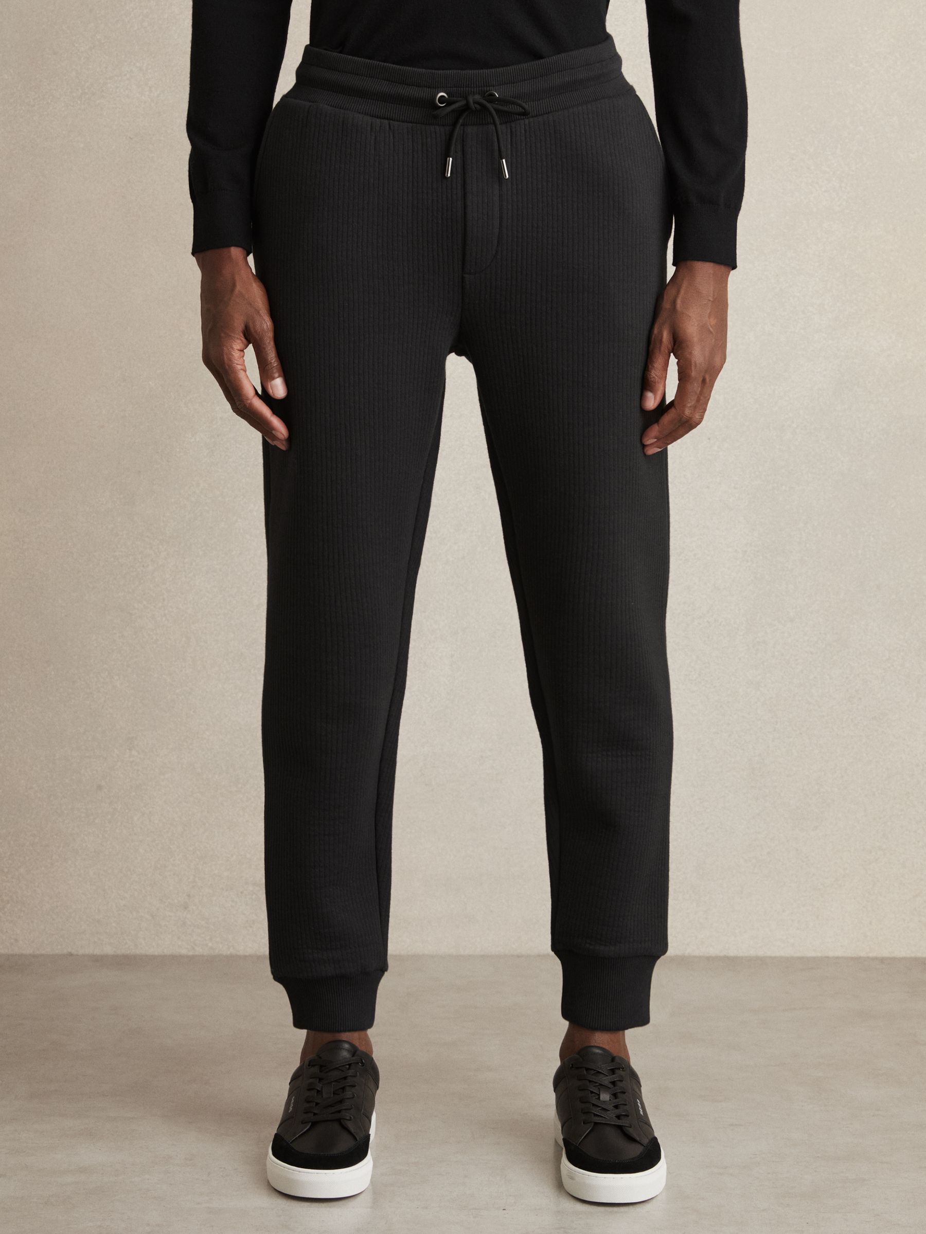 Cotton-Blend Ribbed Drawstring Joggers in Washed Black