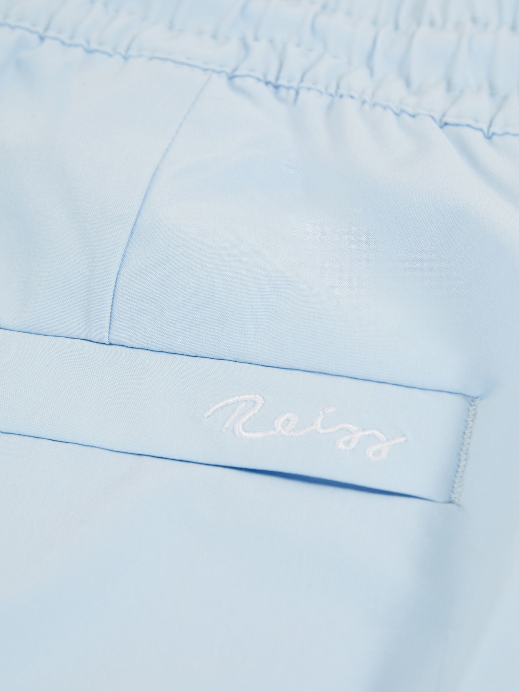 Drawstring Swim Shorts in Soft Blue