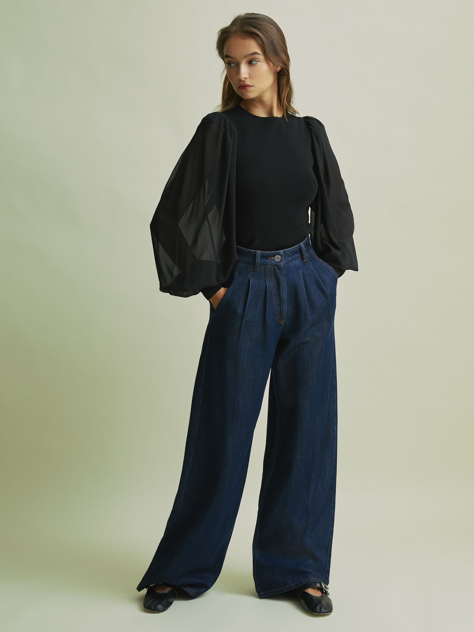 Florere Hybrid Knit Sheer Sleeve Black Top in Black