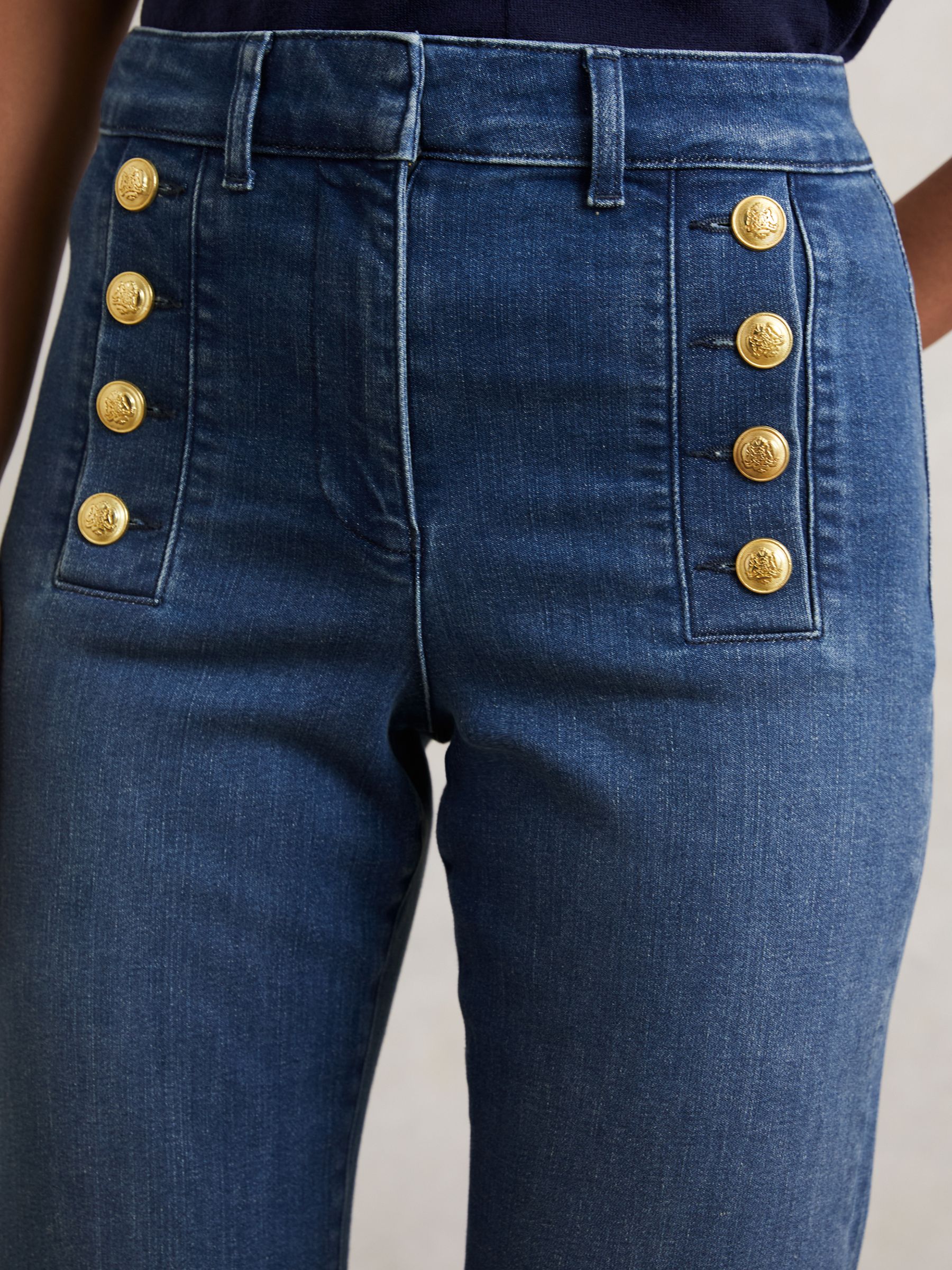 Button-Detail High-Rise Flared Jeans in Mid Blue