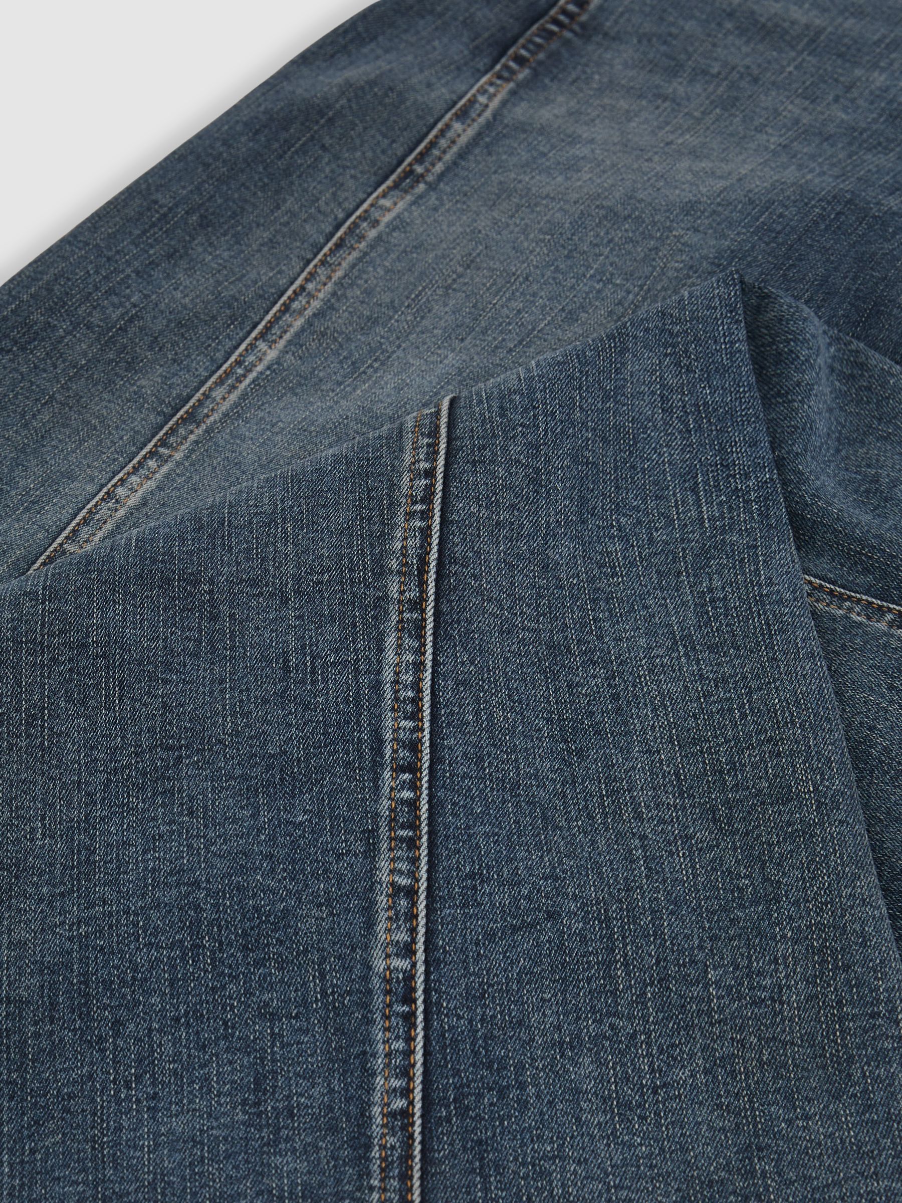 Twist Seam Wide Leg Jeans in Mid Blue