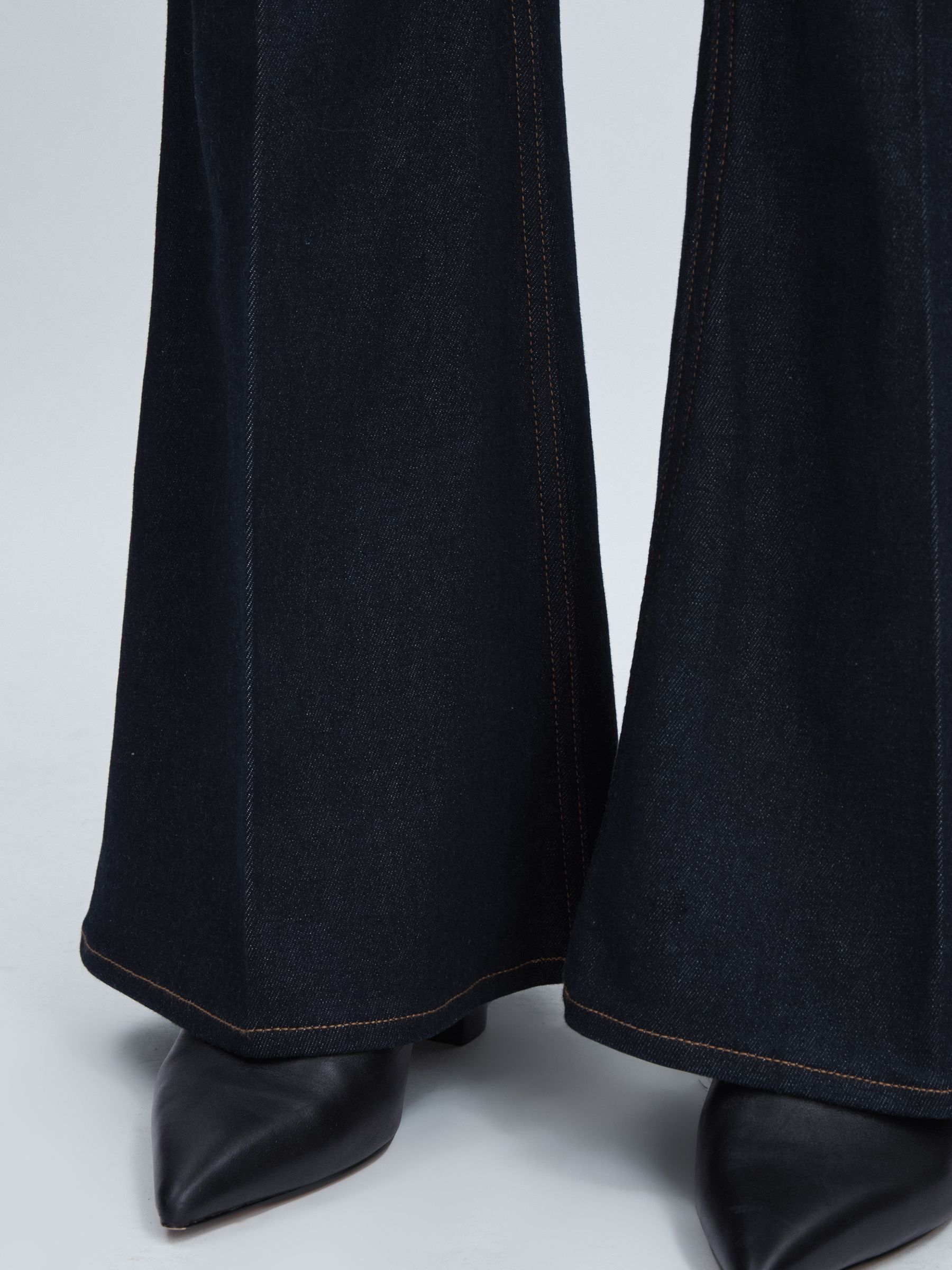 Paige Angled-Waist Flared Jeans in Kira Blue