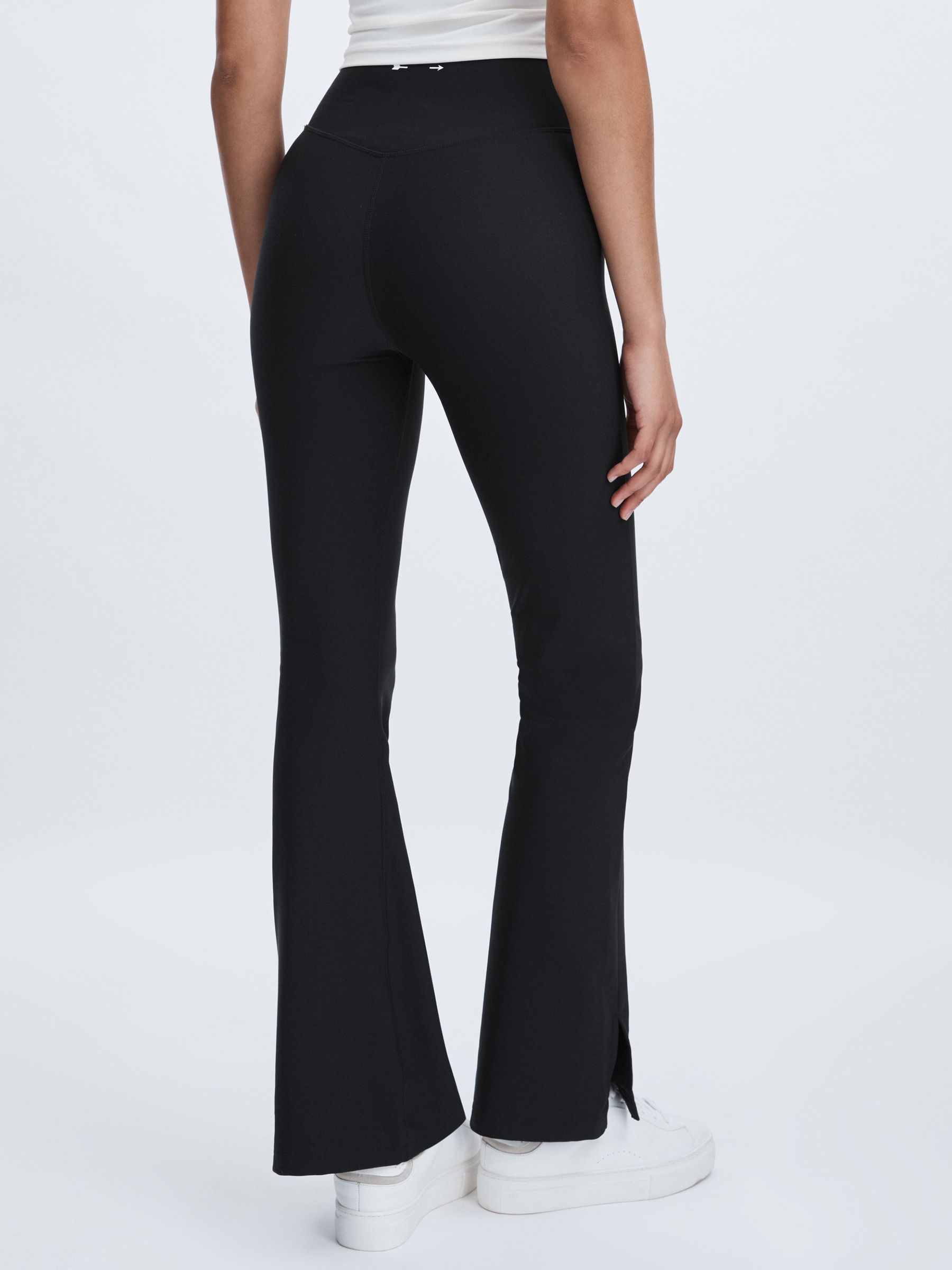 The Upside High Rise Flared Leggings in Black