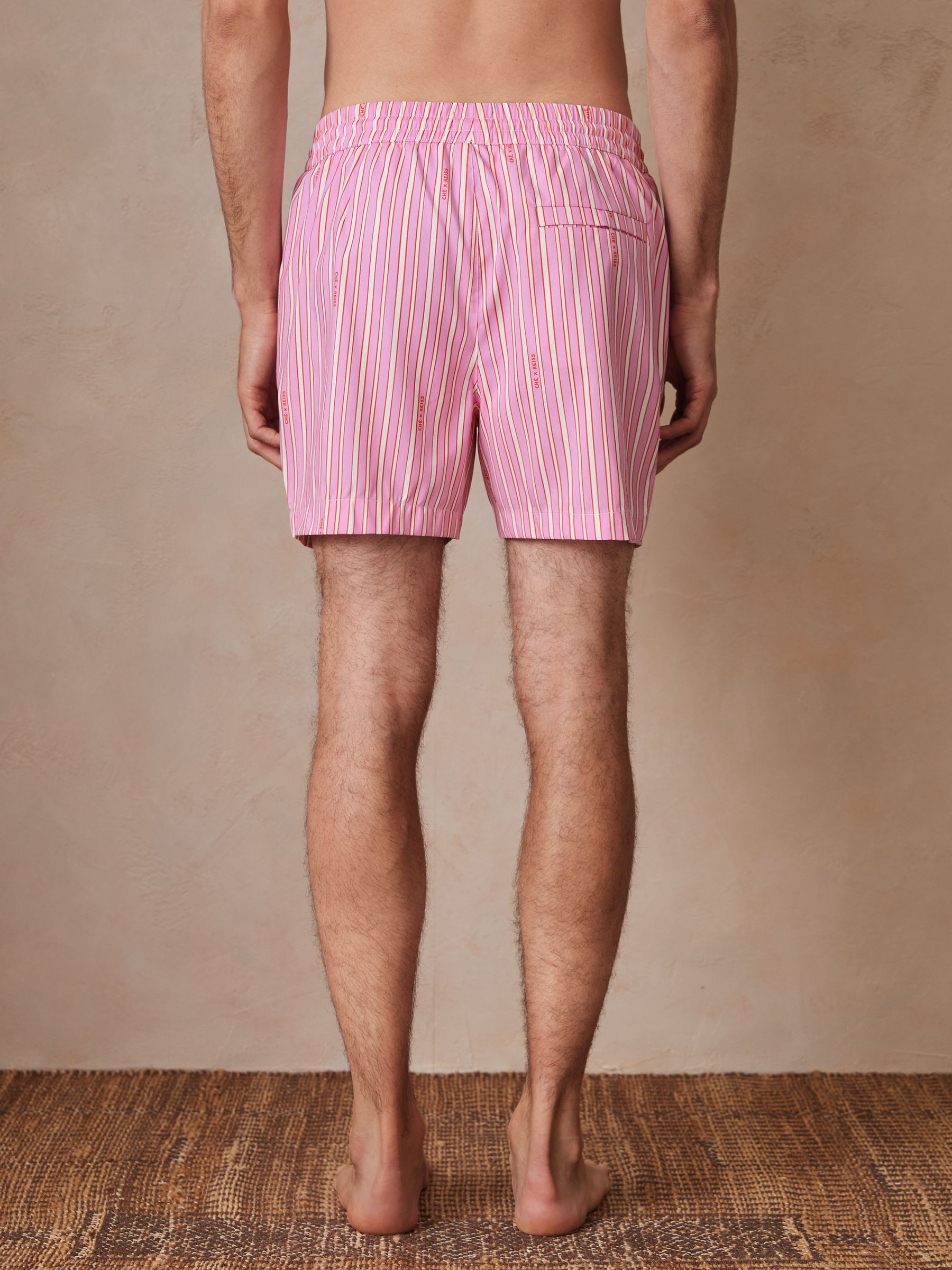 Reiss | Ché Stripe Swim Shorts in Pink/White