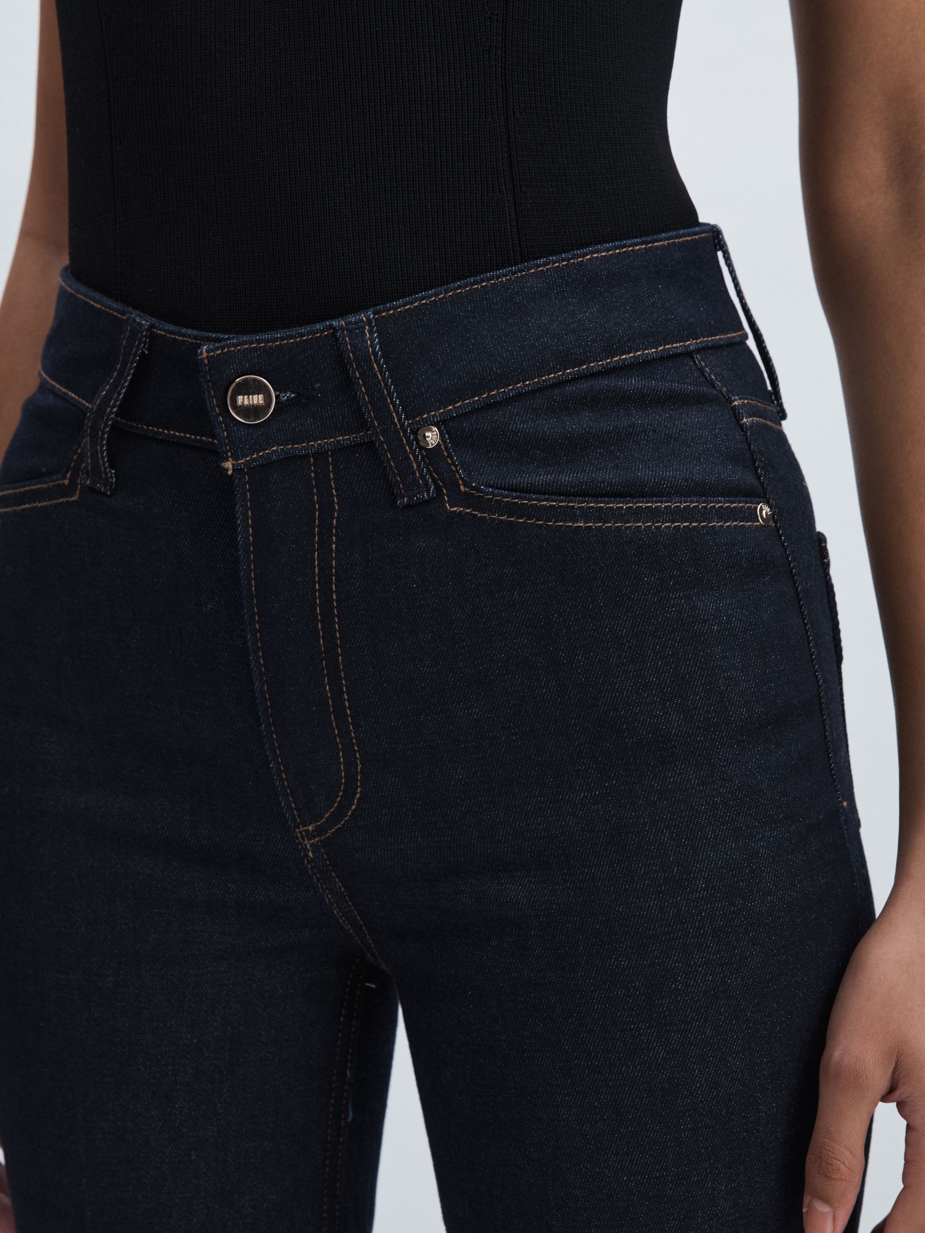 Paige Angled-Waist Flared Jeans in Kira Blue