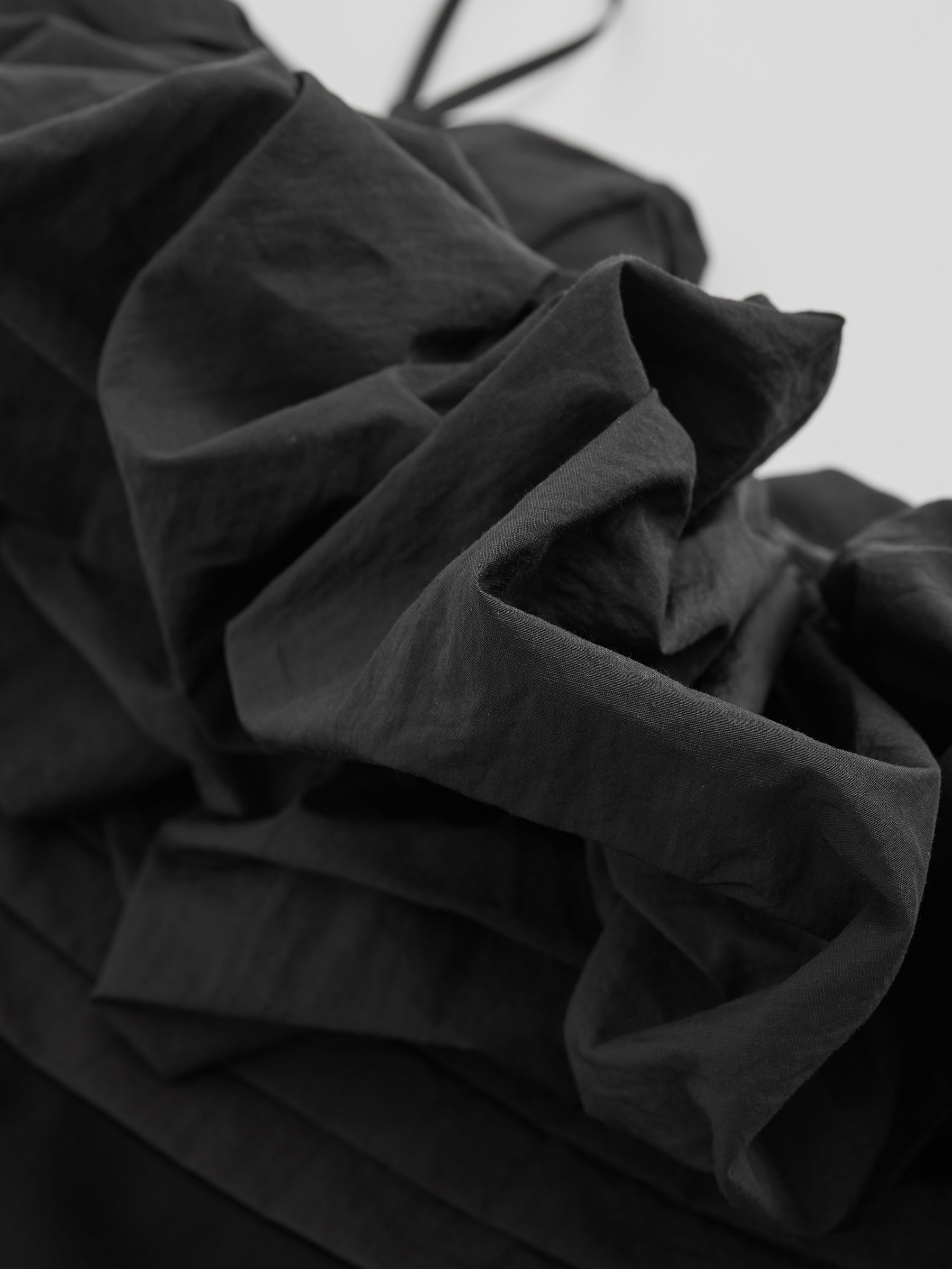 Sculptural Strapless Mini Dress in Black