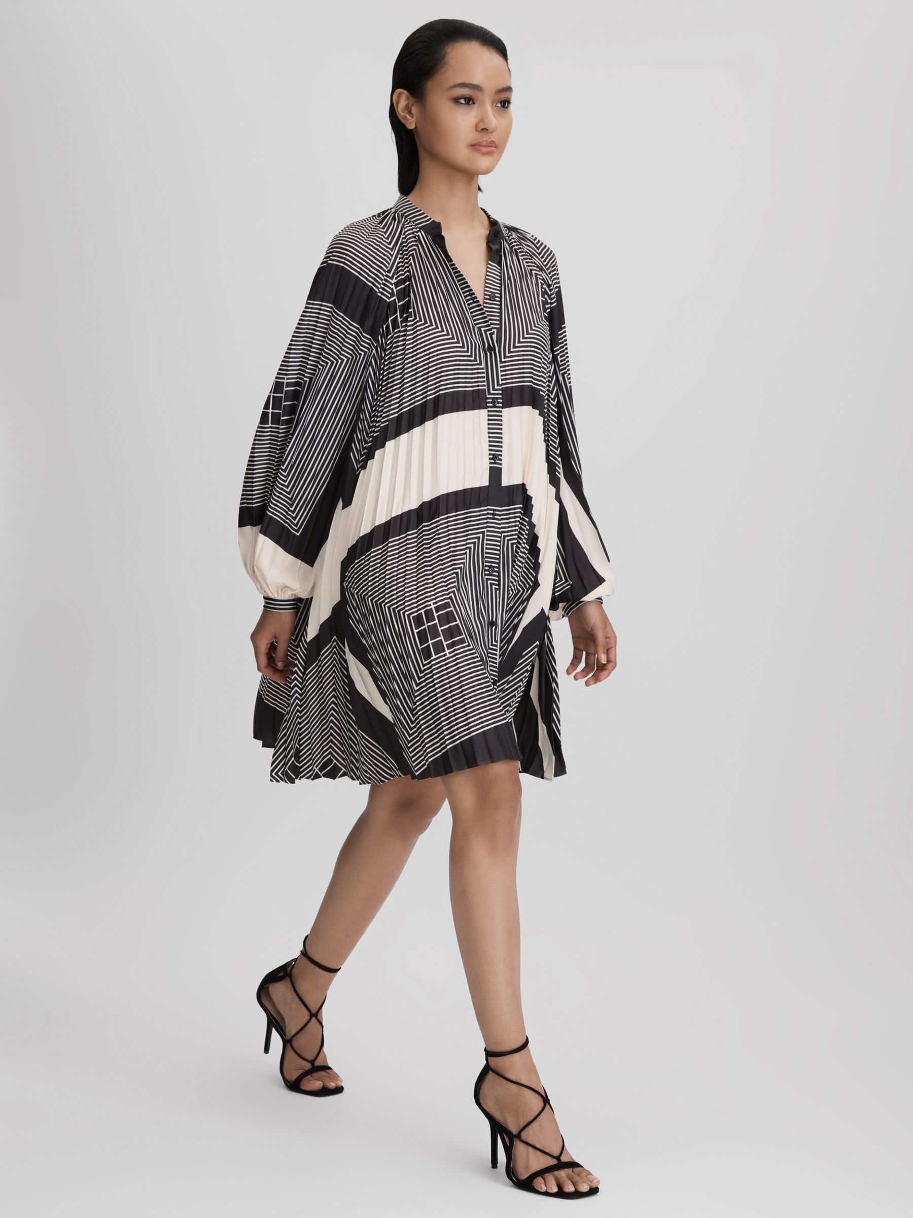 Printed Pleated Mini Dress in Black/White