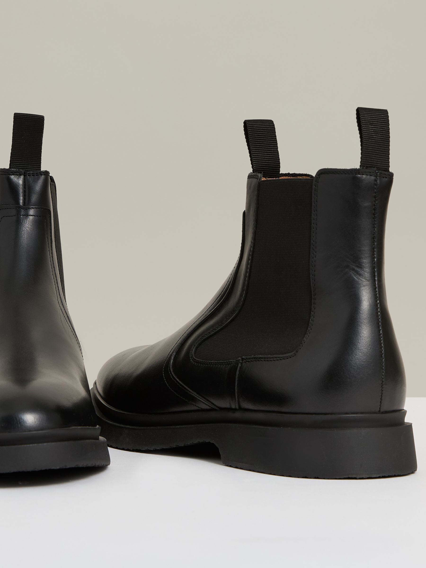 Leather Rubber Sole Chelsea Boots in Black