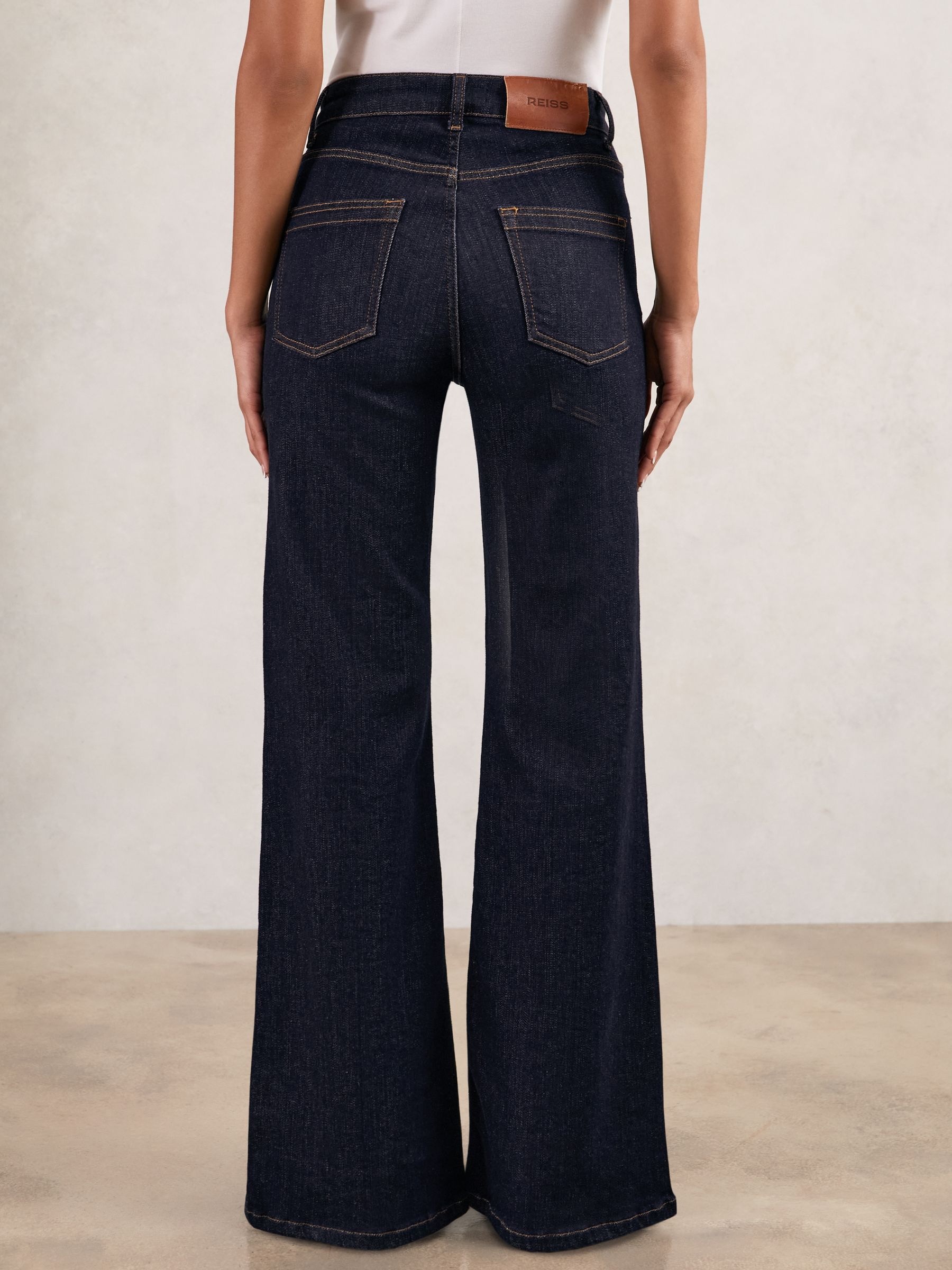 Petite Mid-Rise Flared Jeans in Dark Blue
