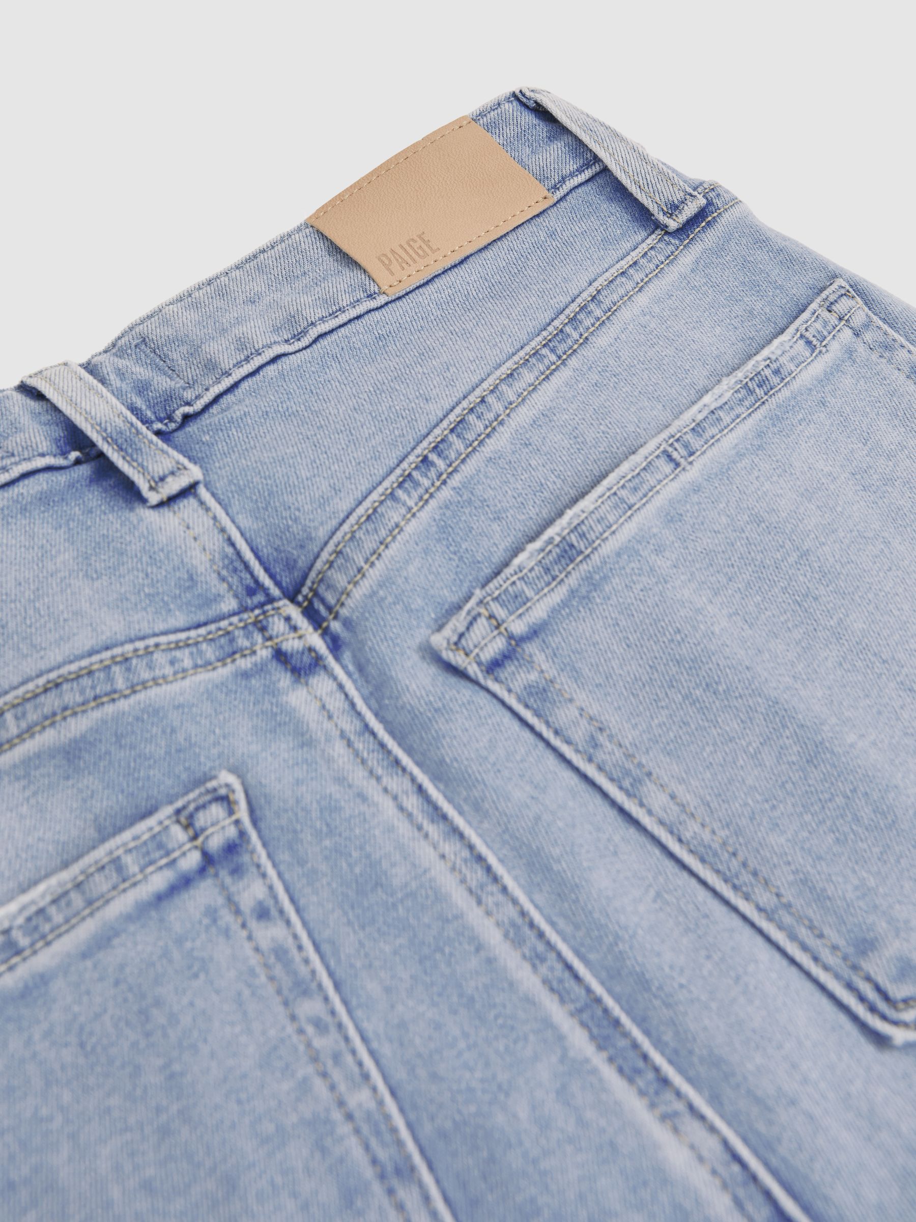 Paige Mid-Rise Flared Jeans in Light Blue