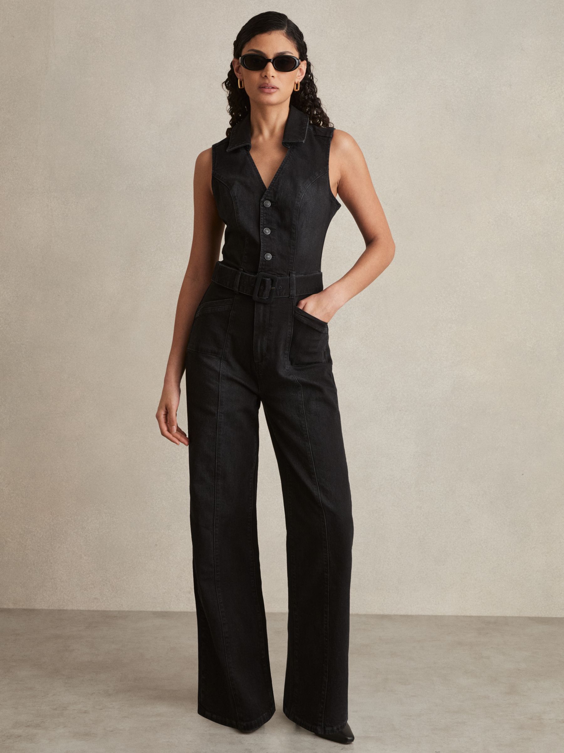 Paige Sleeveless Denim Jumpsuit in Washed Black