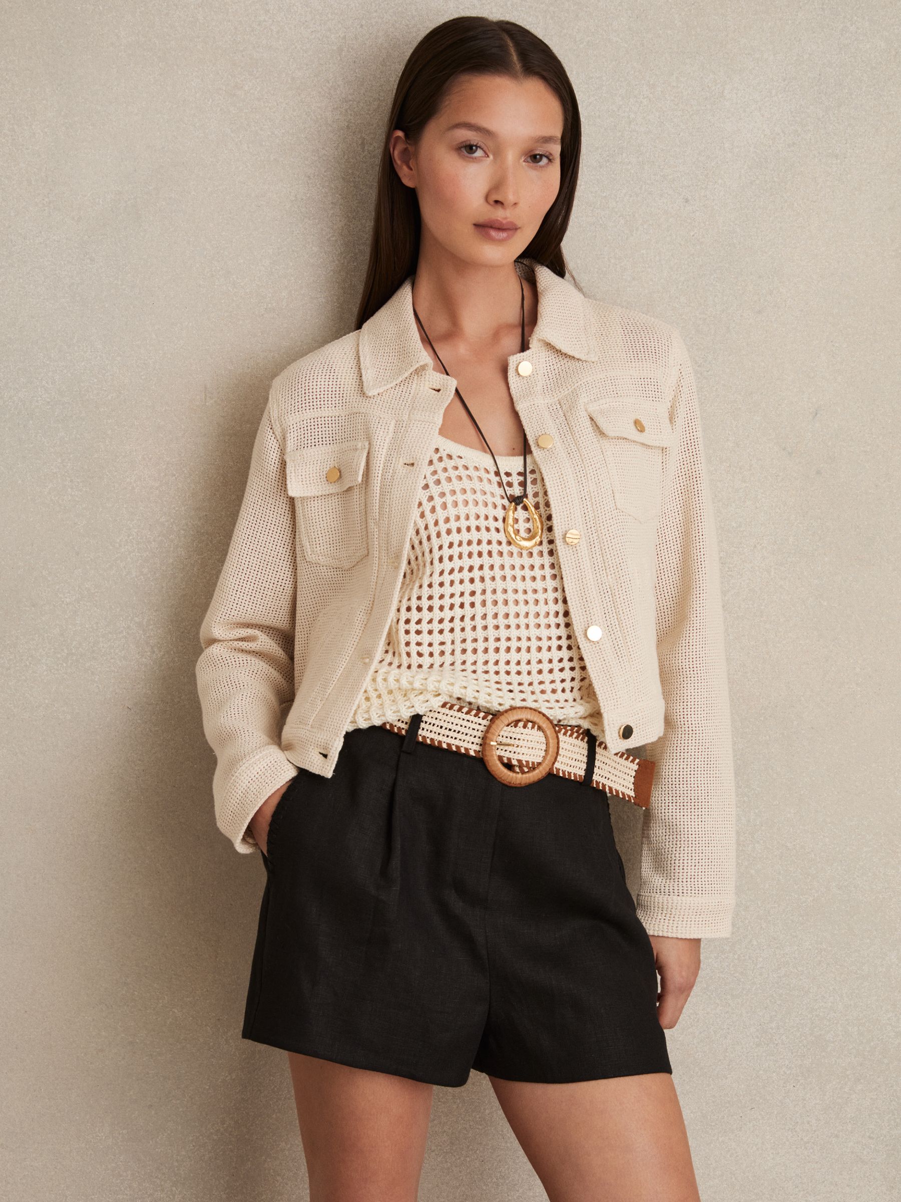 Linen Pleat-Front Belted Shorts in Black