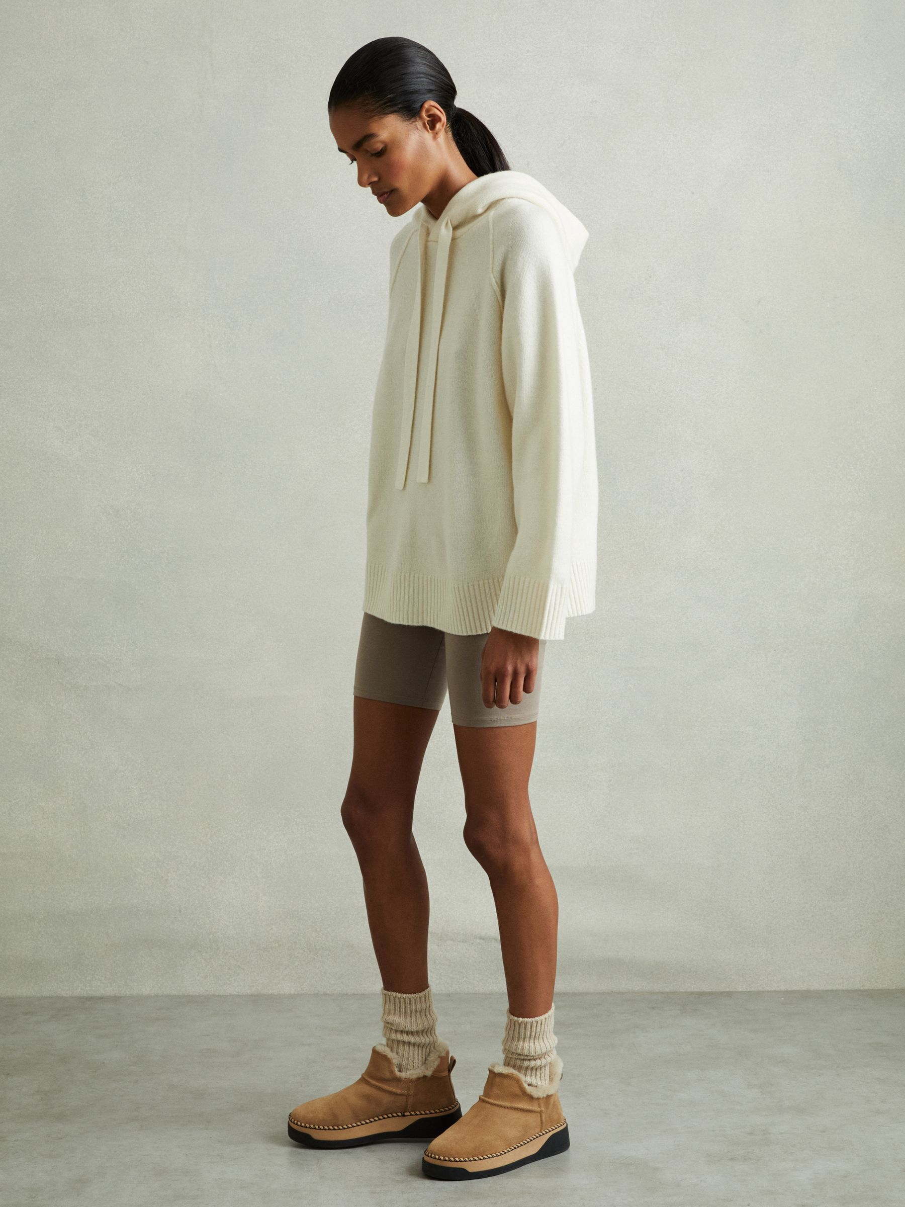 Shearling-Lined Suede Ankle Boots in Tan