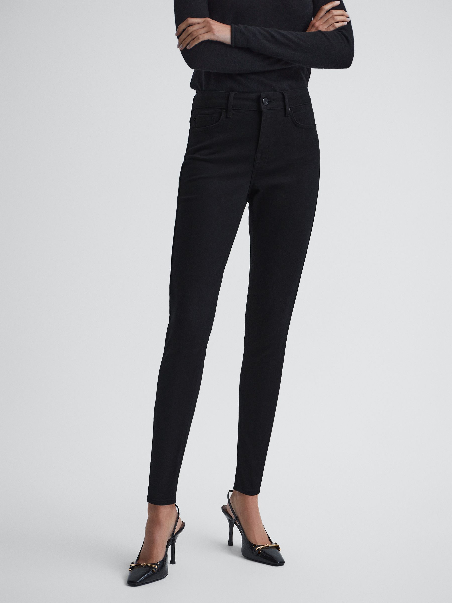 Mid Rise Skinny Jeans in Black