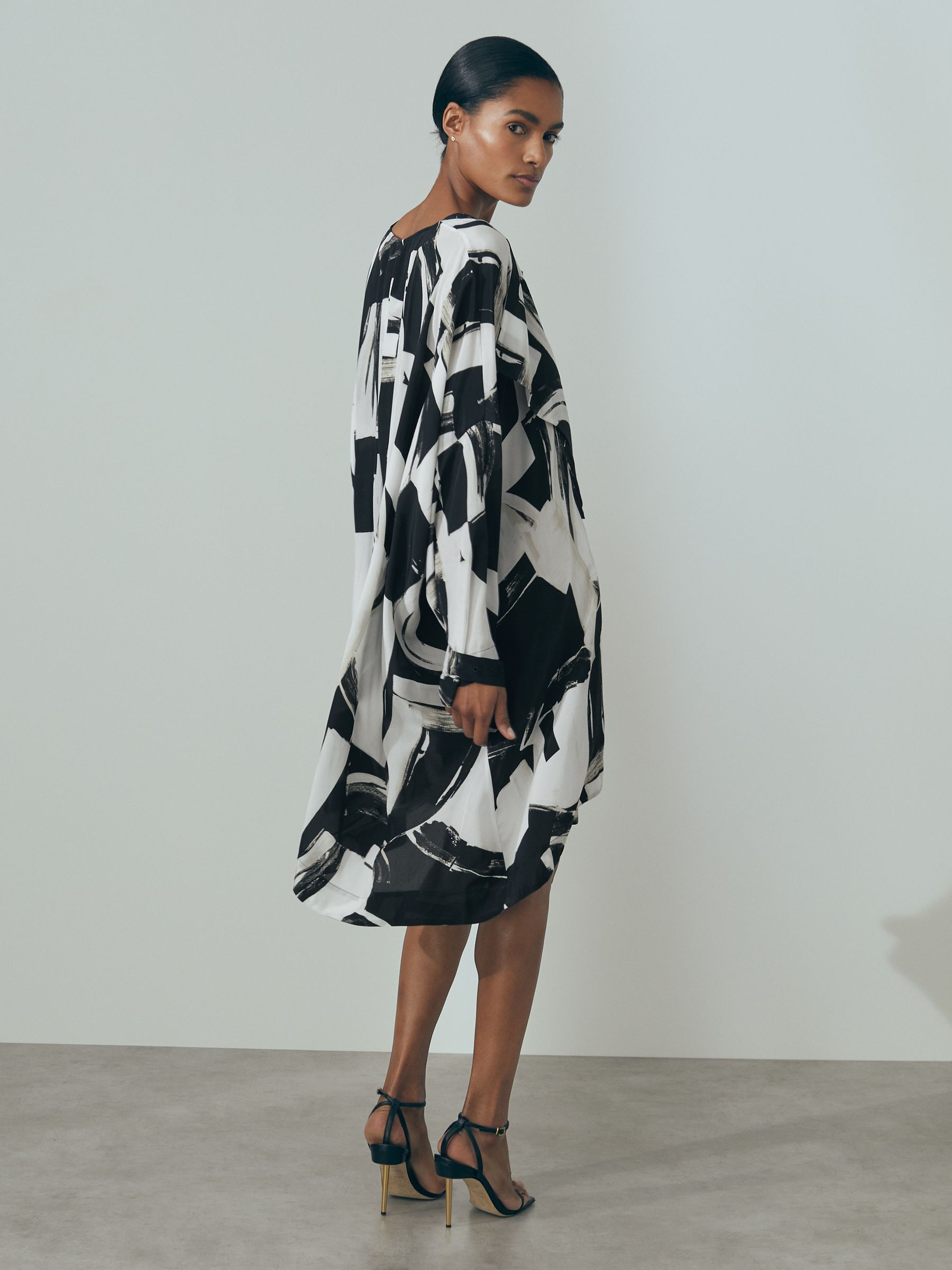 Atelier Italian Cape Sleeve Mini Dress in White/Black