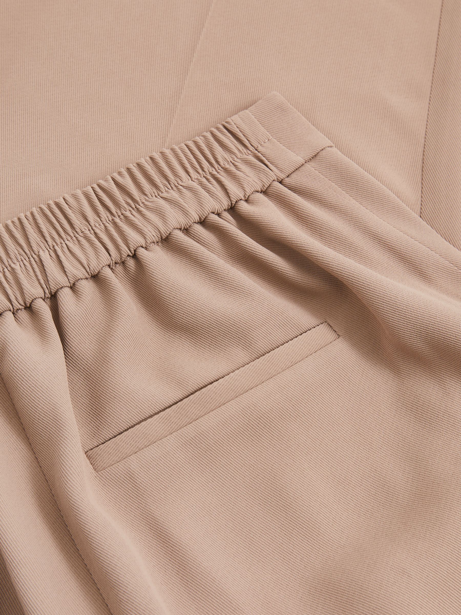 Tapered Elasticated-Waist Trousers in Mink Neutral