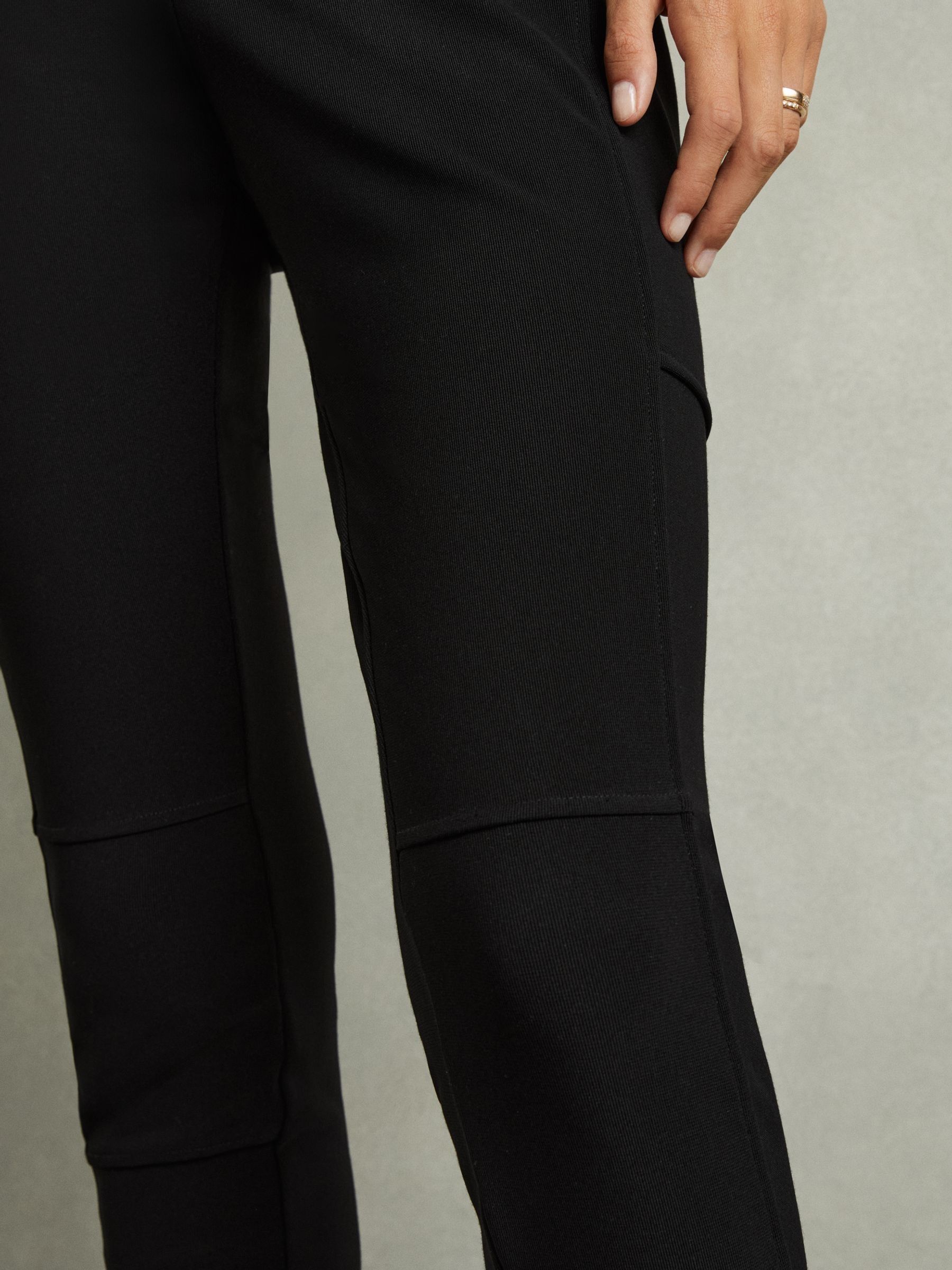Panelled Jersey Skinny-Fit Trousers in Black