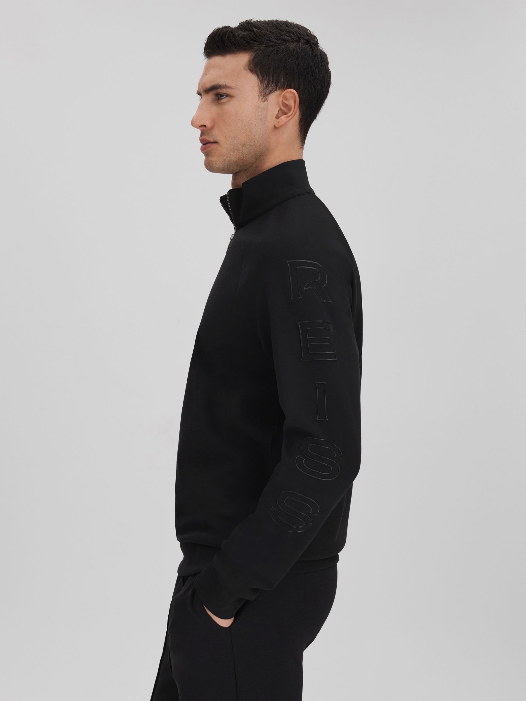 Interlock Jersey Half-Zip Funnel Neck Sweatshirt in Black