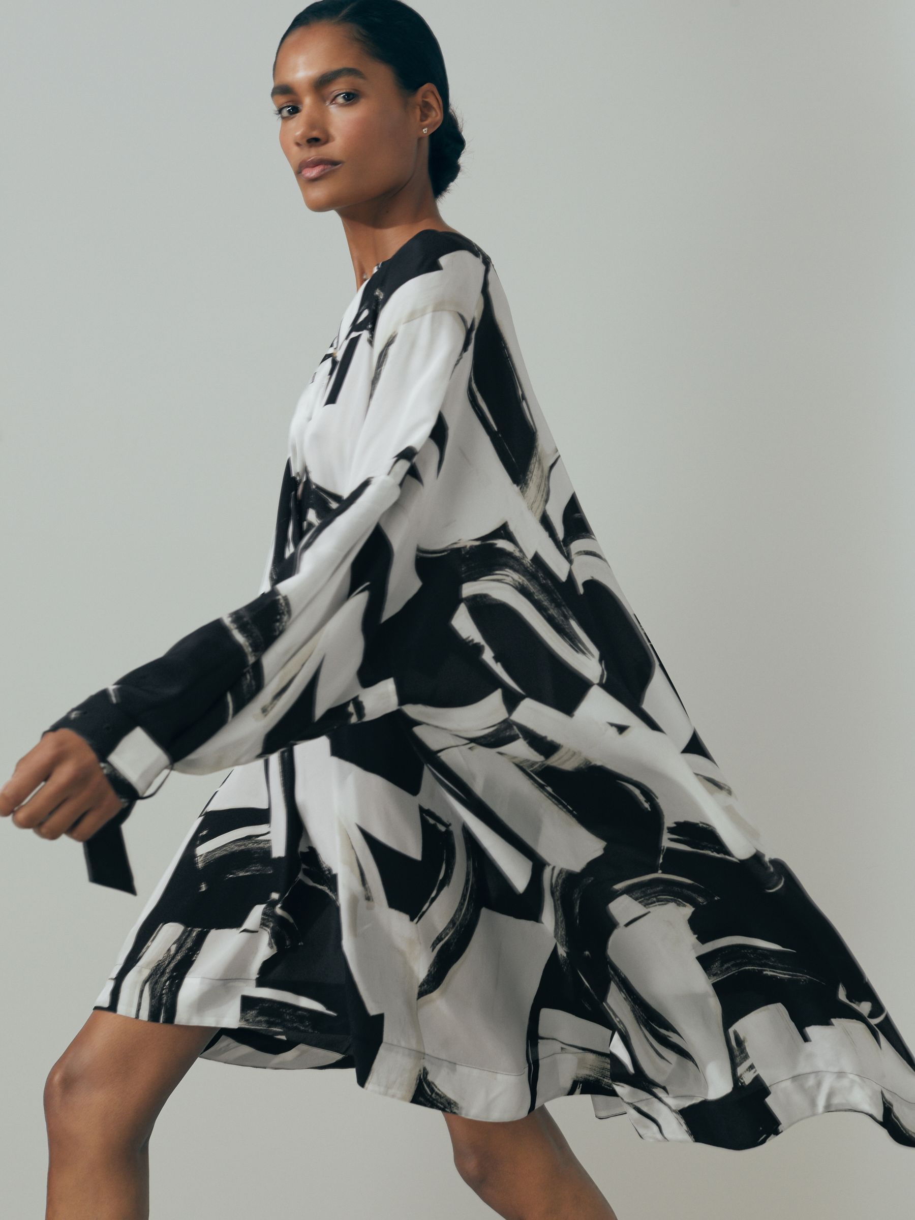 Atelier Italian Cape Sleeve Mini Dress in White/Black